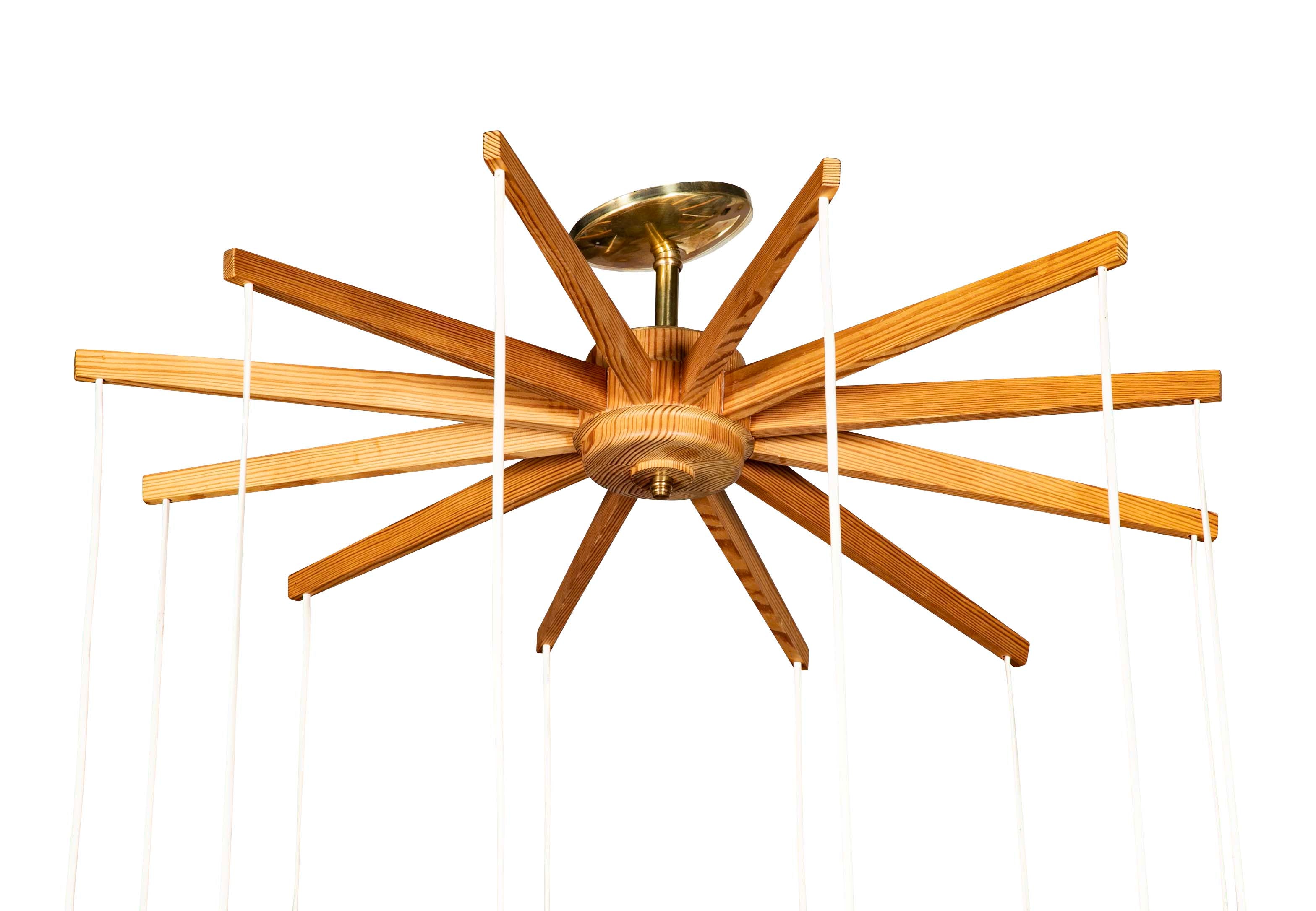 A Swedish Mid-Century 10 Lamp Suspended Ceiling Light of Pine