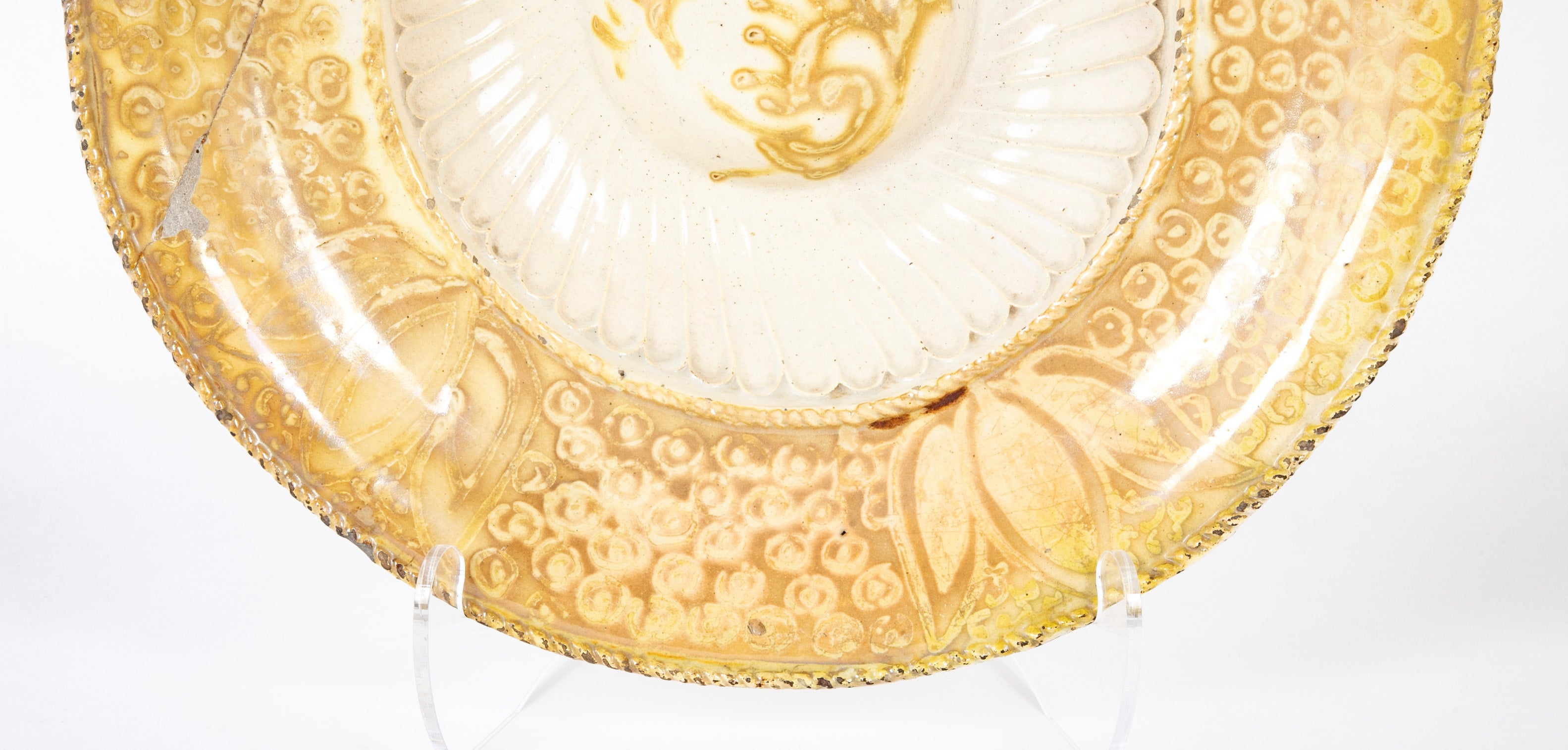 A 19th Century Hispano - Moresque Yellow Charger with Faint Lustre Glaze