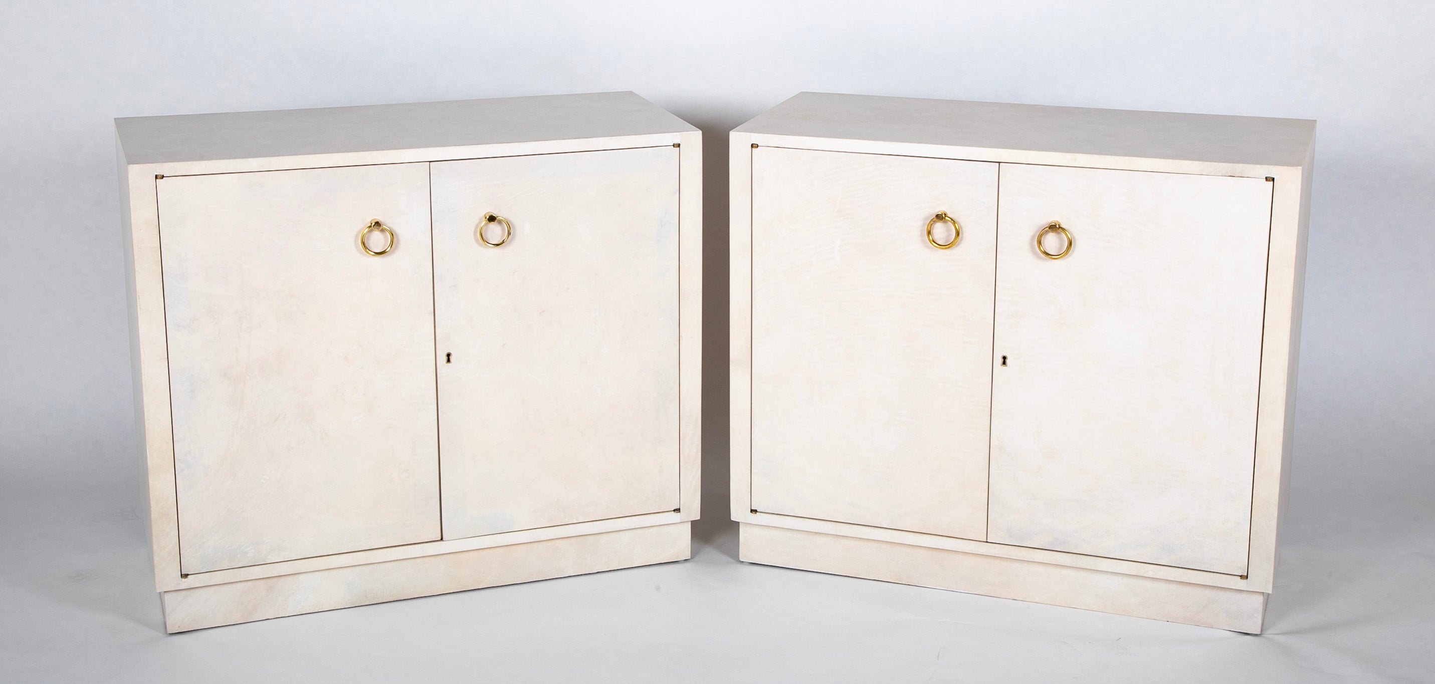 Pair of Two Door Parchment Cabinets in the Manner of Samuel Marx