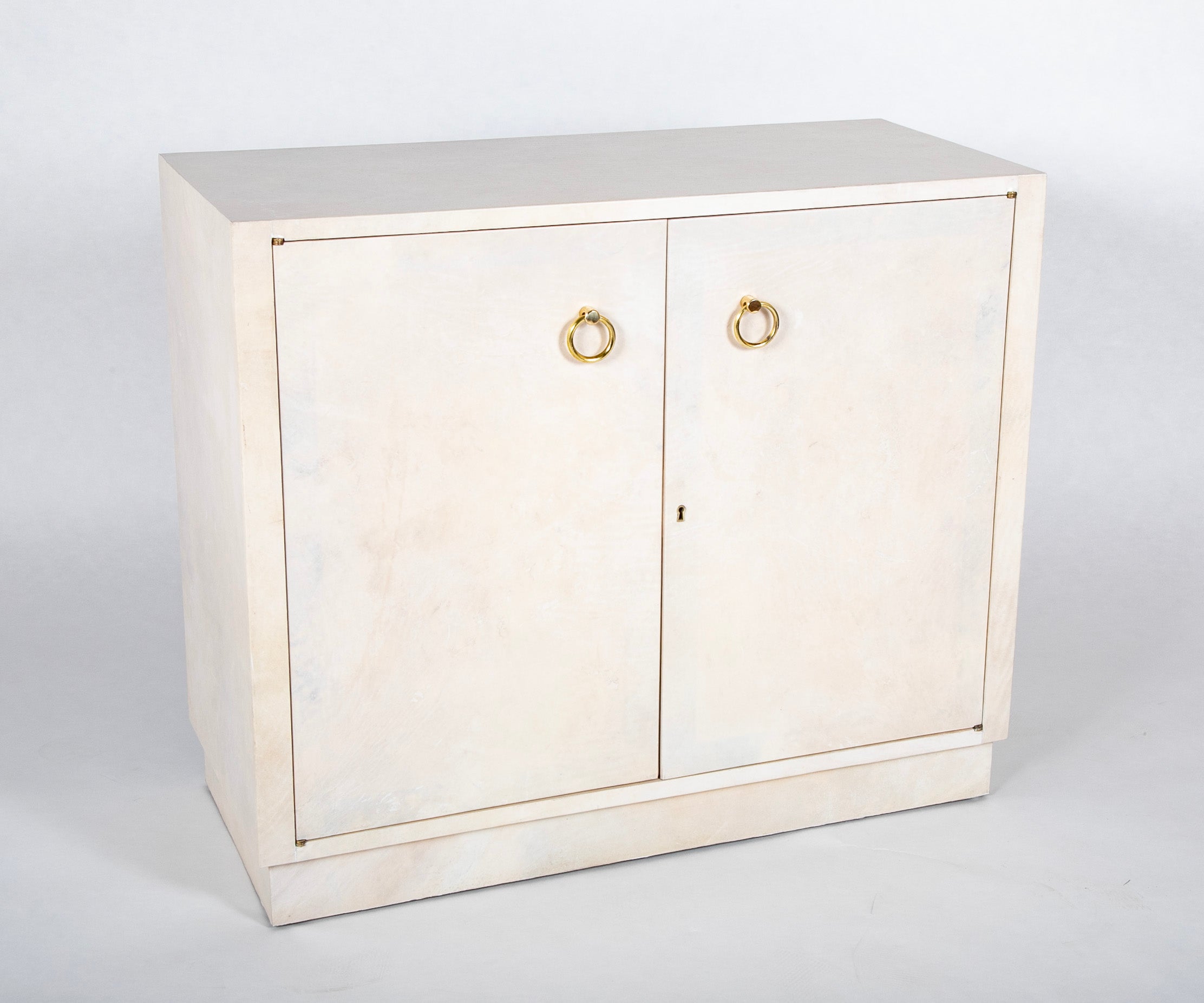 Pair of Two Door Parchment Cabinets in the Manner of Samuel Marx