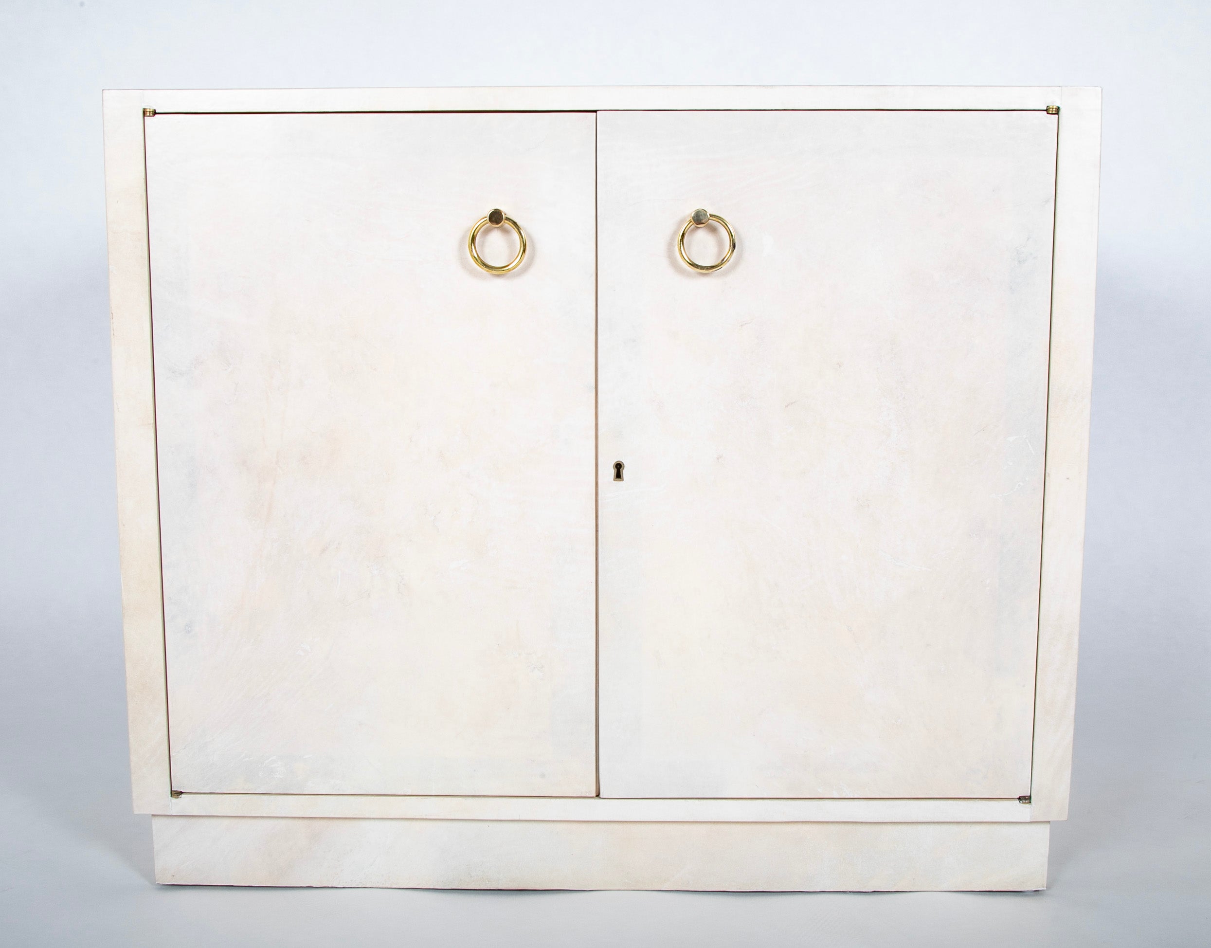 Pair of Two Door Parchment Cabinets in the Manner of Samuel Marx