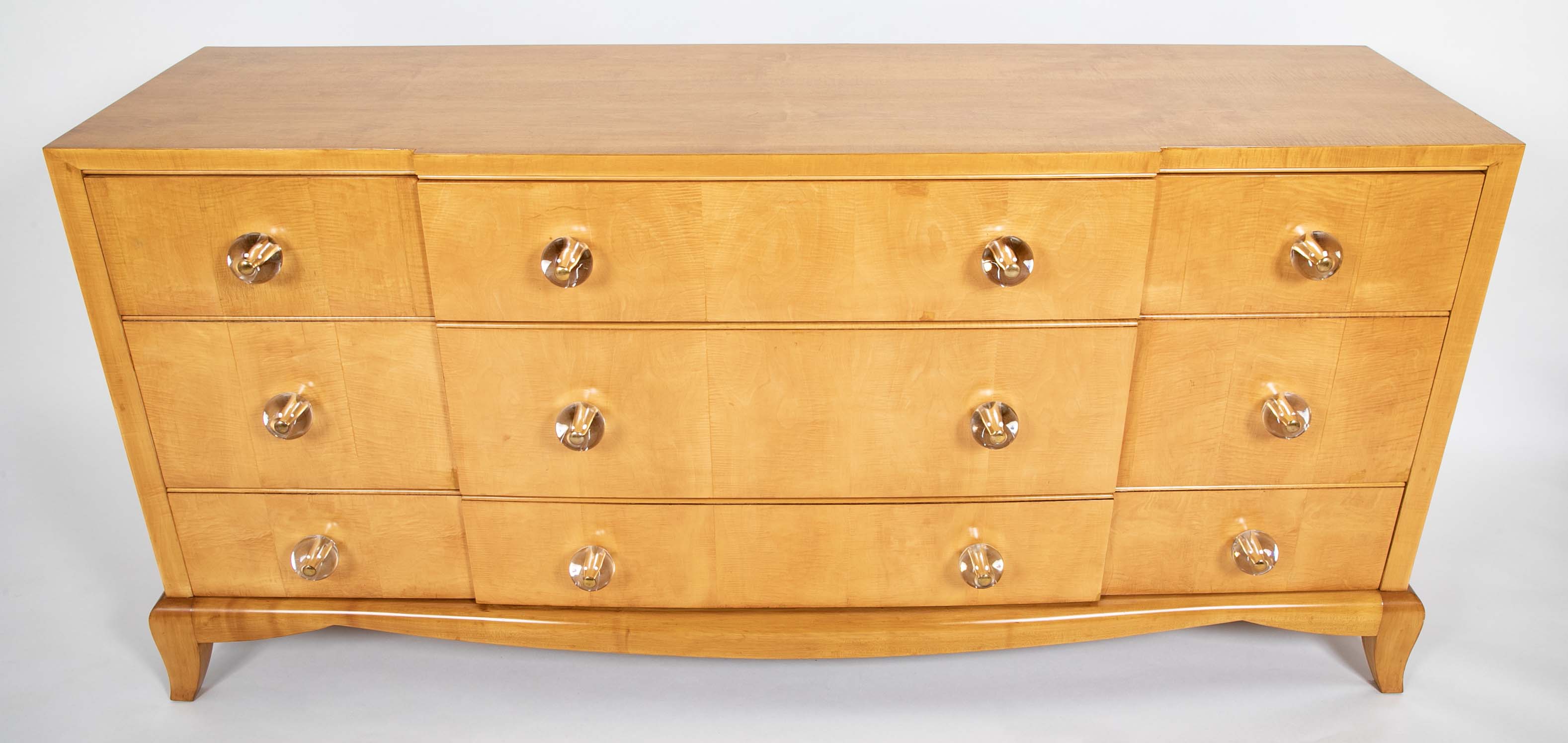 A French Sycamore Veneered Chest of Drawers Attributed to Andre Arbus