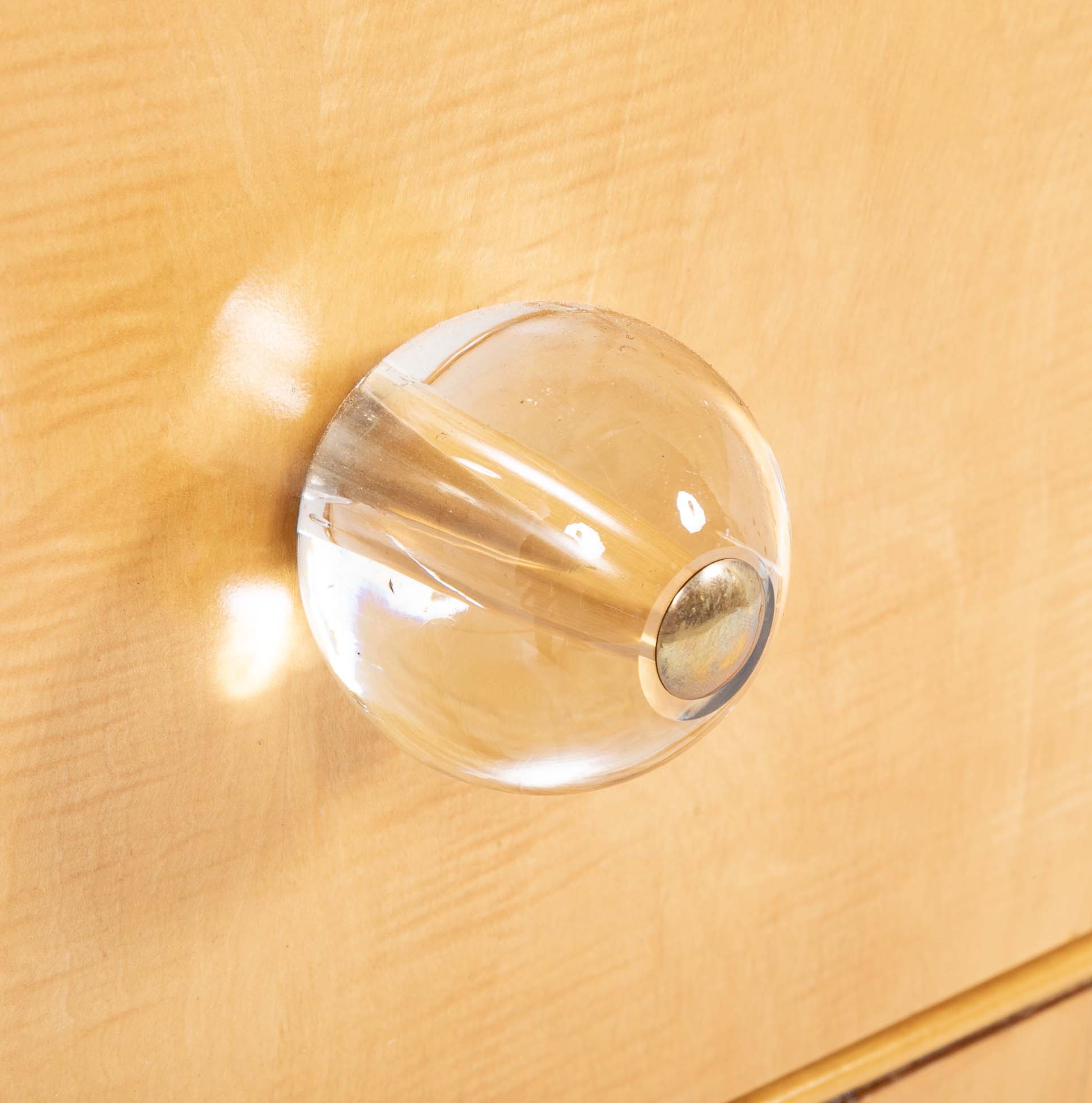 A French Sycamore Veneered Chest of Drawers Attributed to Andre Arbus