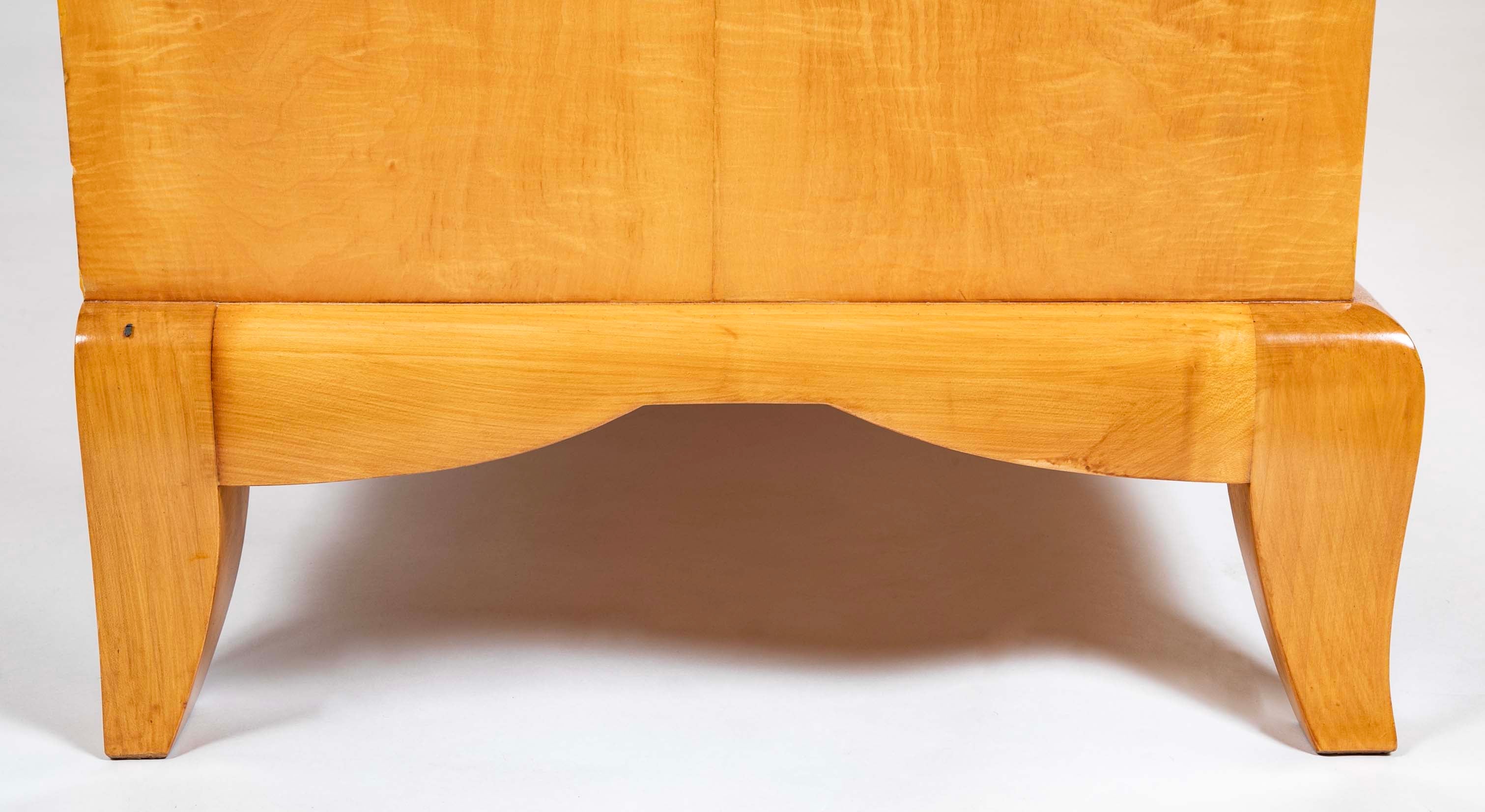 A French Sycamore Veneered Chest of Drawers Attributed to Andre Arbus