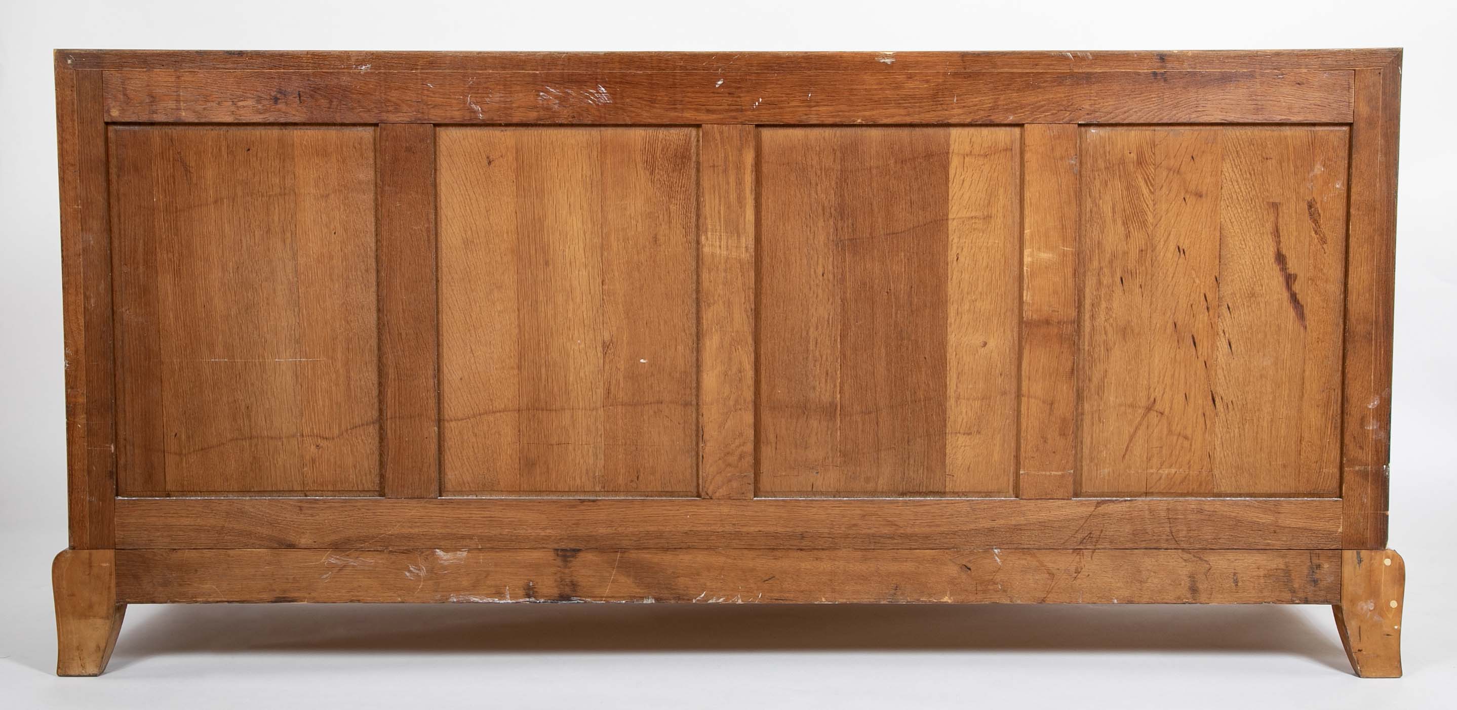 A French Sycamore Veneered Chest of Drawers Attributed to Andre Arbus