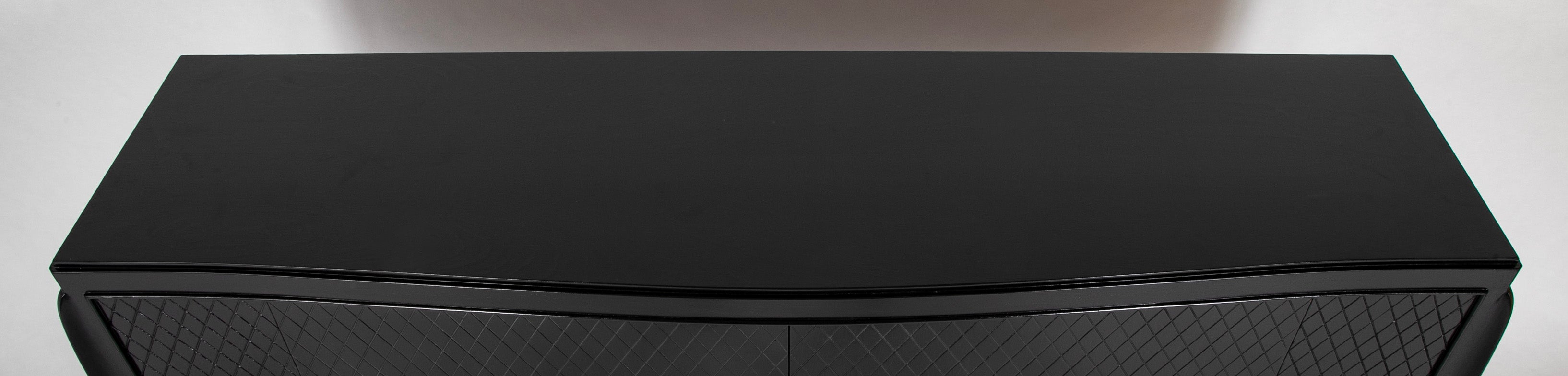 A Jean Pascaud Ebonized Two Door Buffet Cabinet
