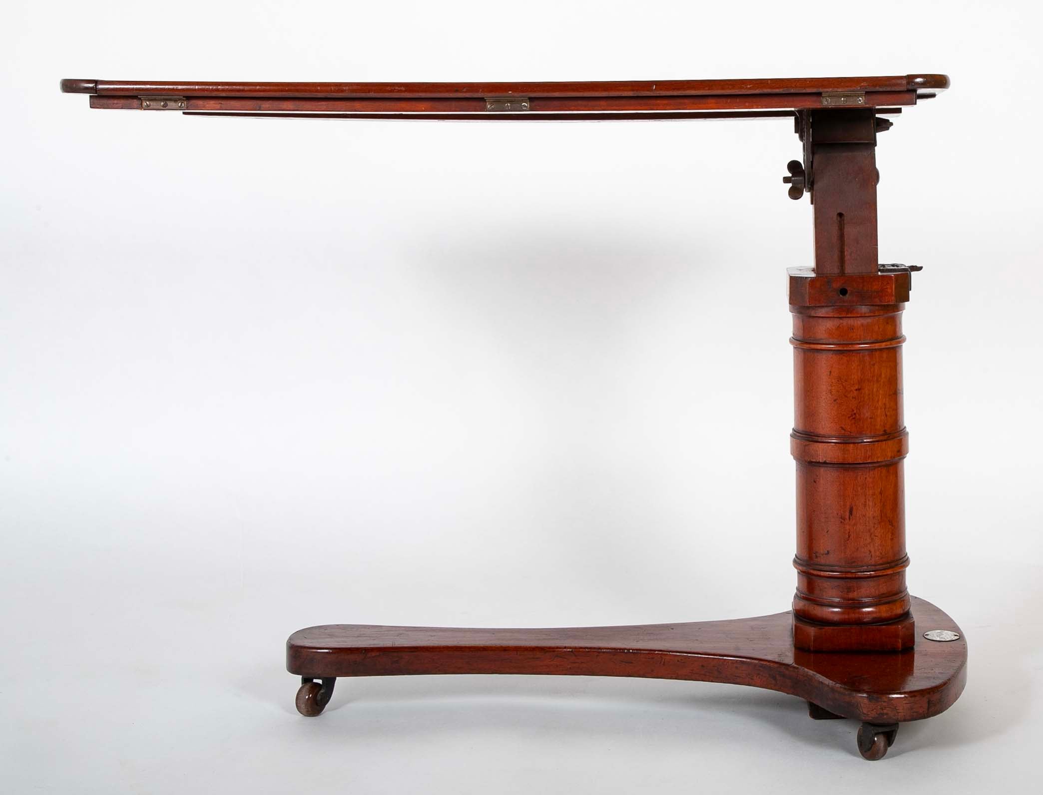 An Early 20th Century English Adjustable Reading Table on Casters