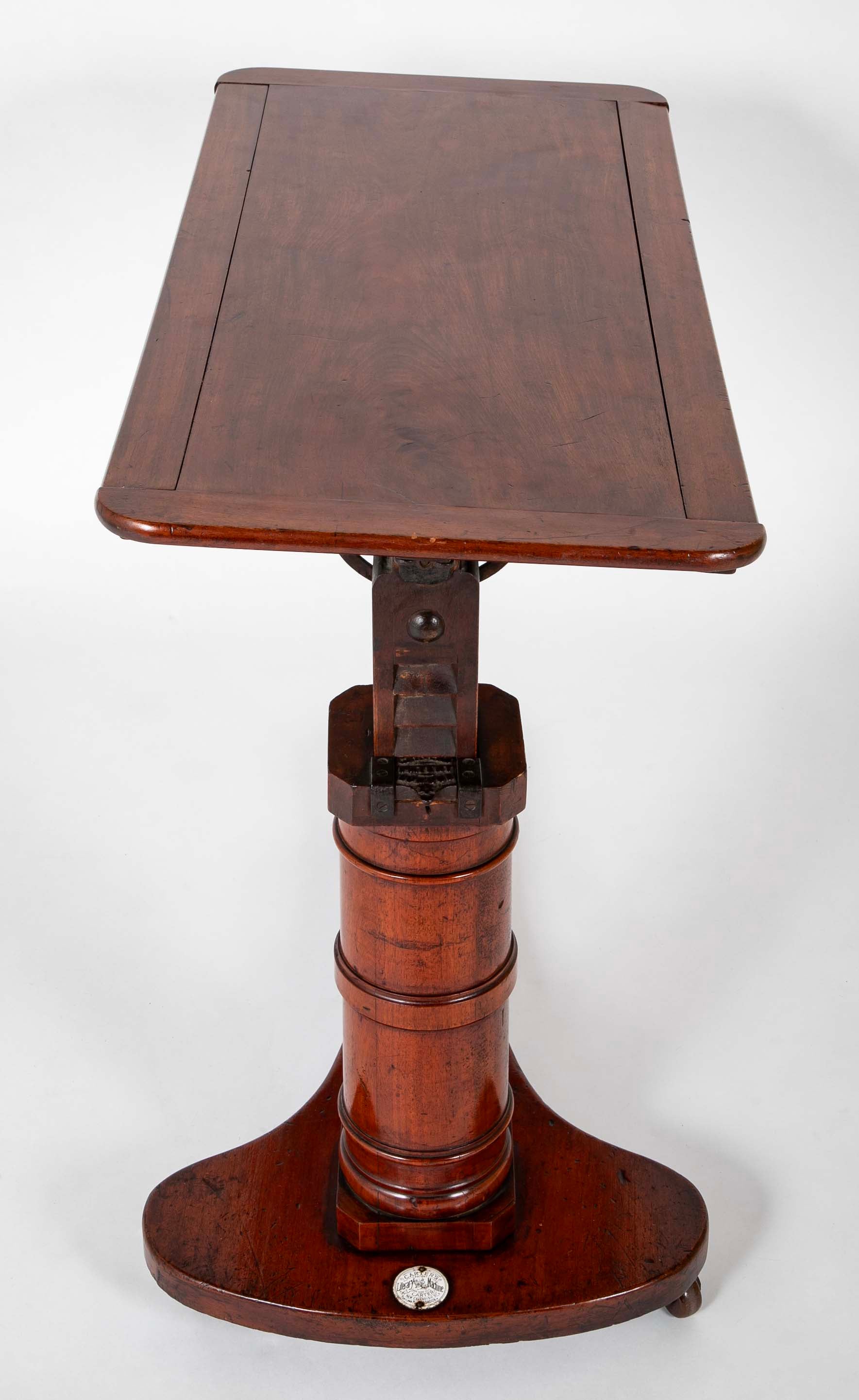 An Early 20th Century English Adjustable Reading Table on Casters