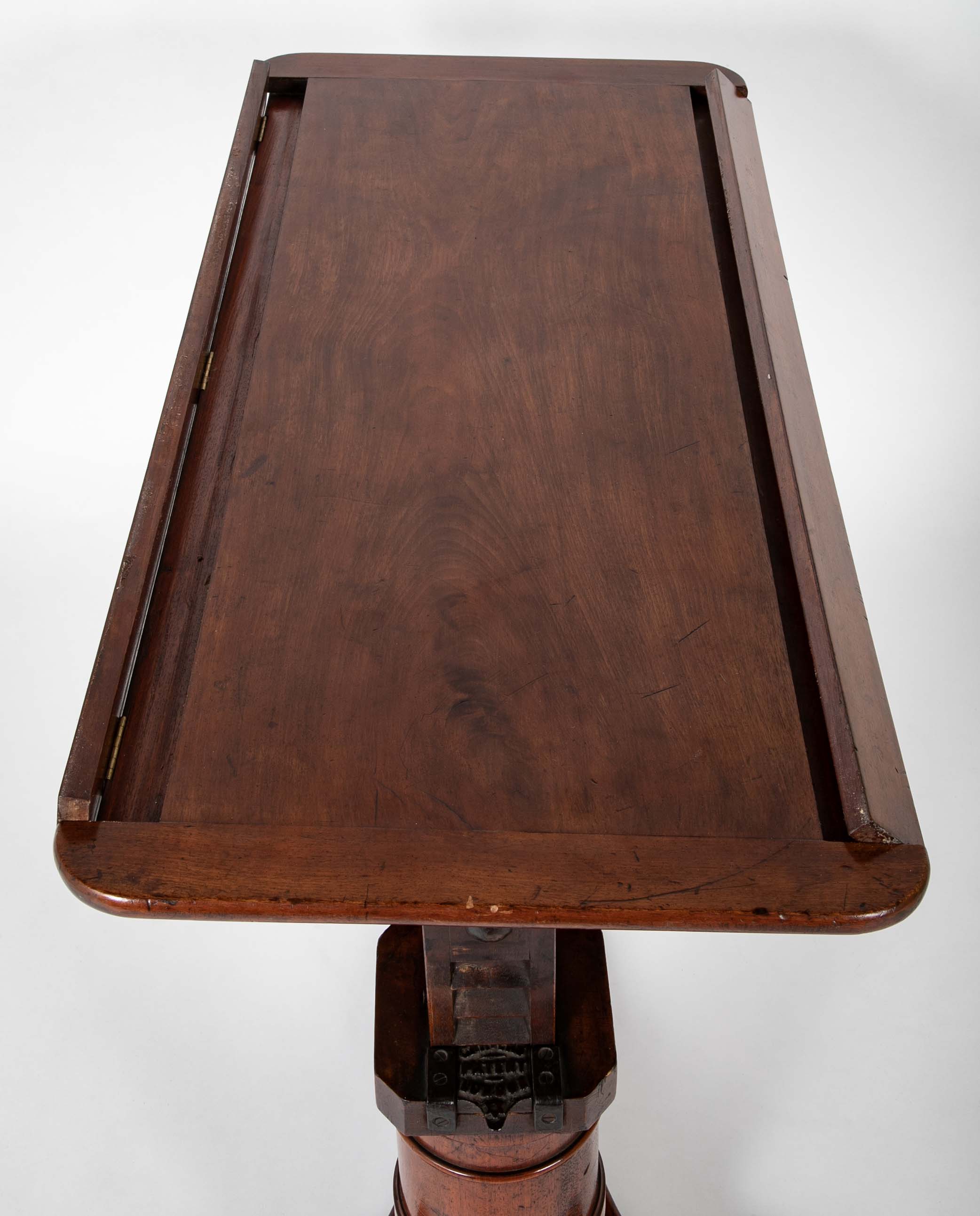 An Early 20th Century English Adjustable Reading Table on Casters