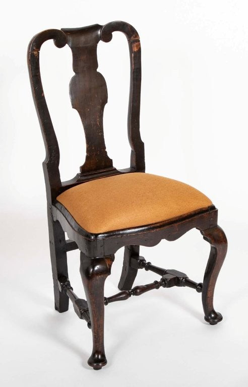 A set of 10 Queen Anne Black Painted Dining Chairs