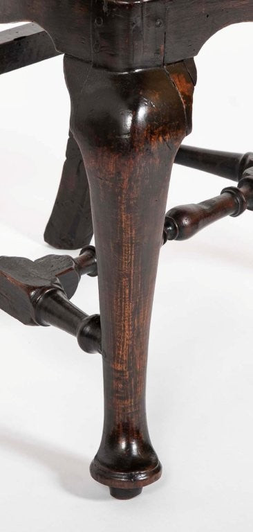 A set of 10 Queen Anne Black Painted Dining Chairs