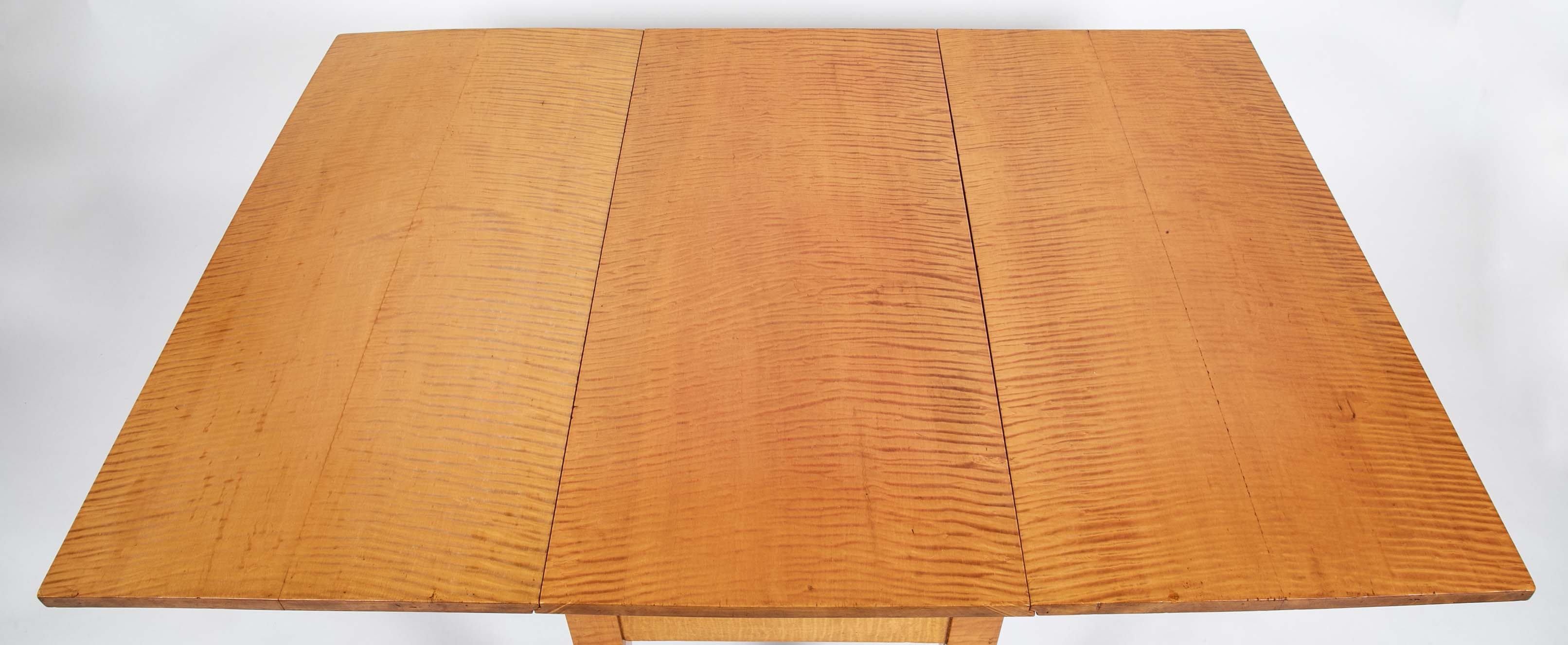 An American Federal Drop Leaf Tiger Maple Table
