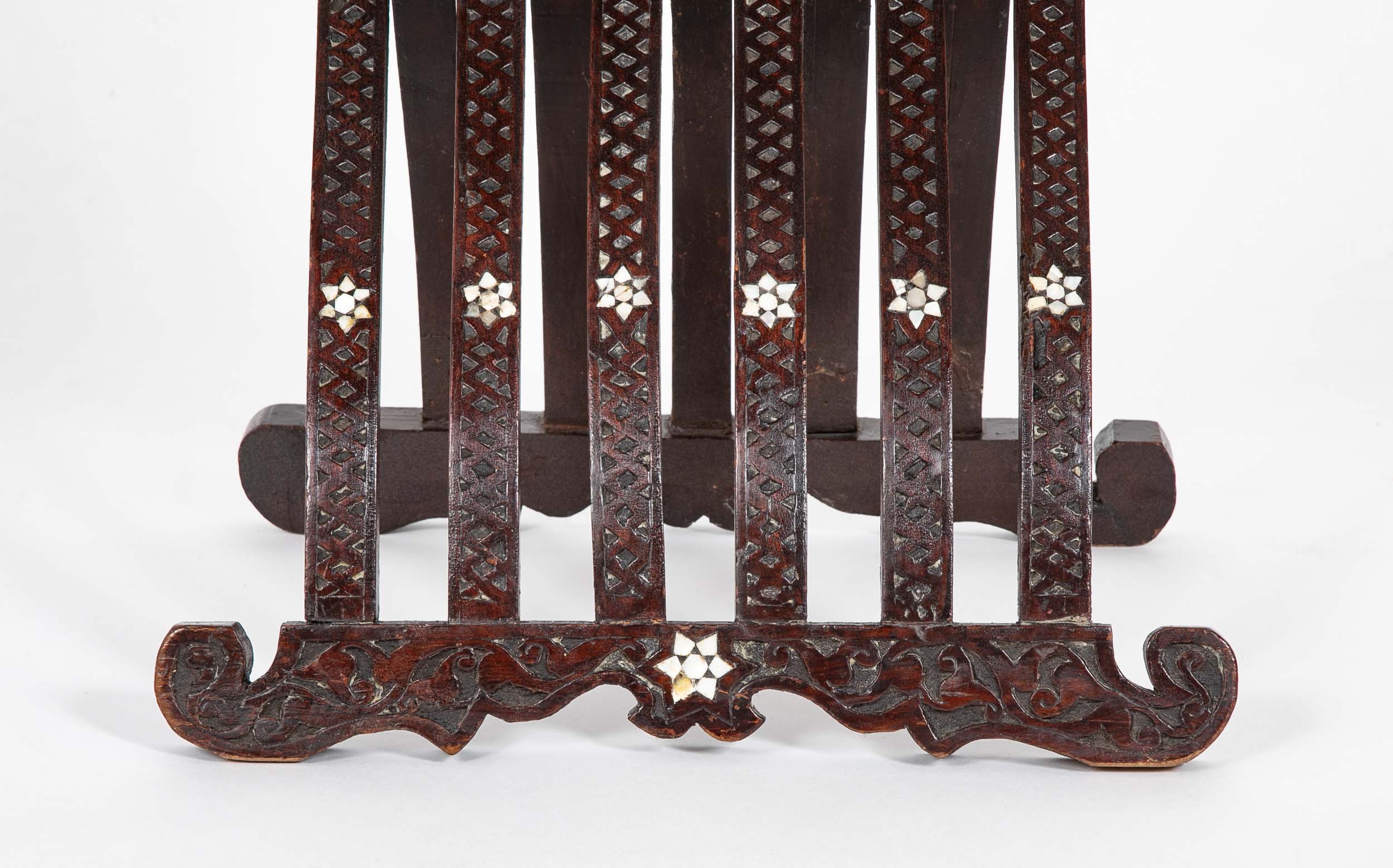A Syrian Carved Hardwood Folding Chair with Abalone Inlays