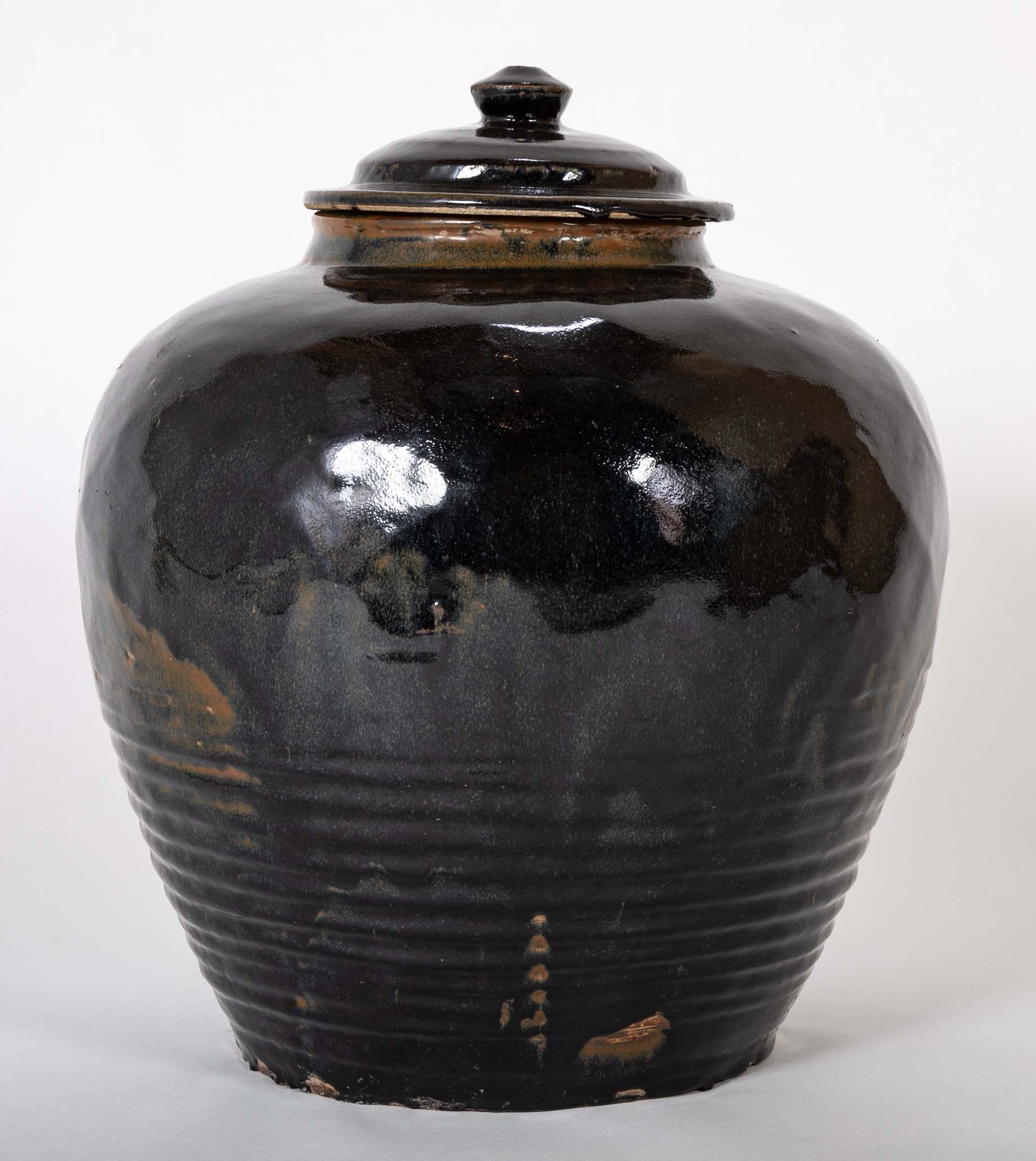 A Chinese Henan Dark Glaze Lidded Jar
