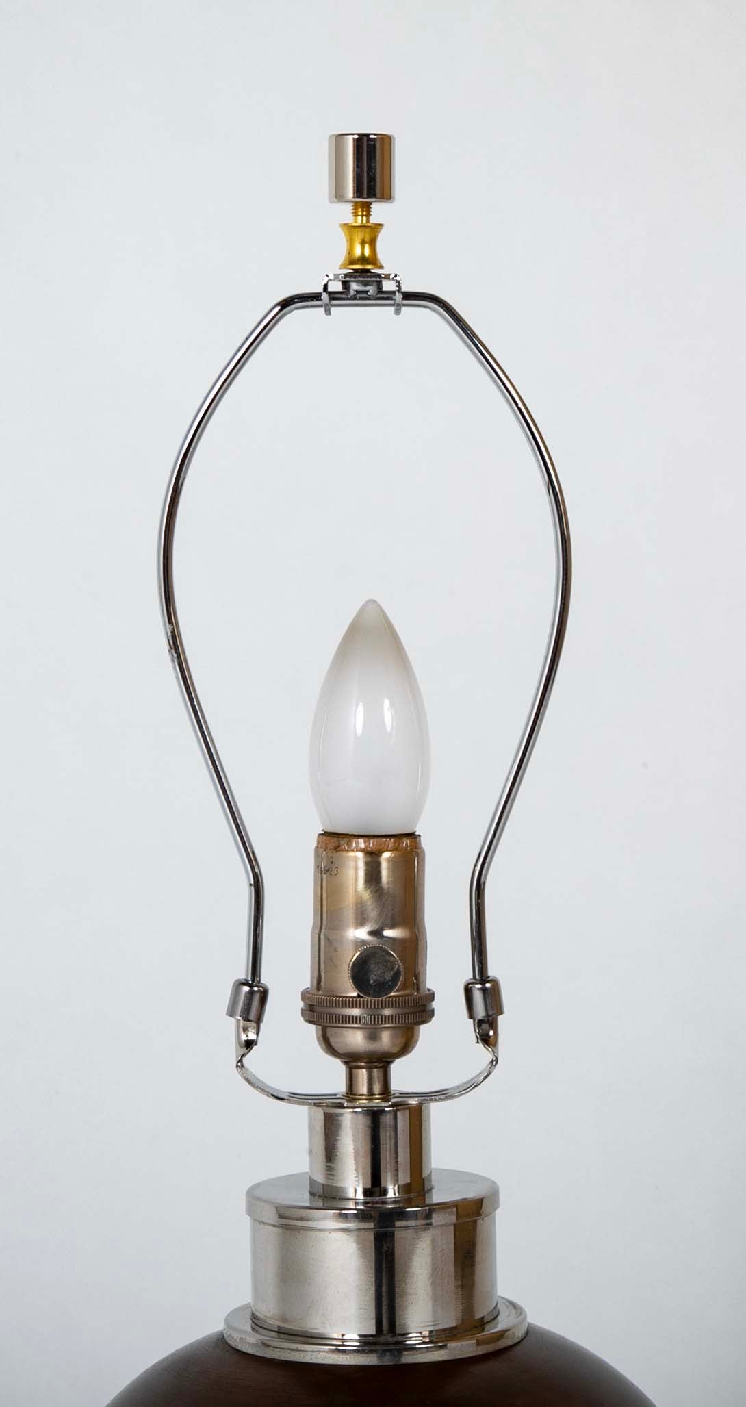 A French Turned Wood Sphere on Metal Base as a Lamp