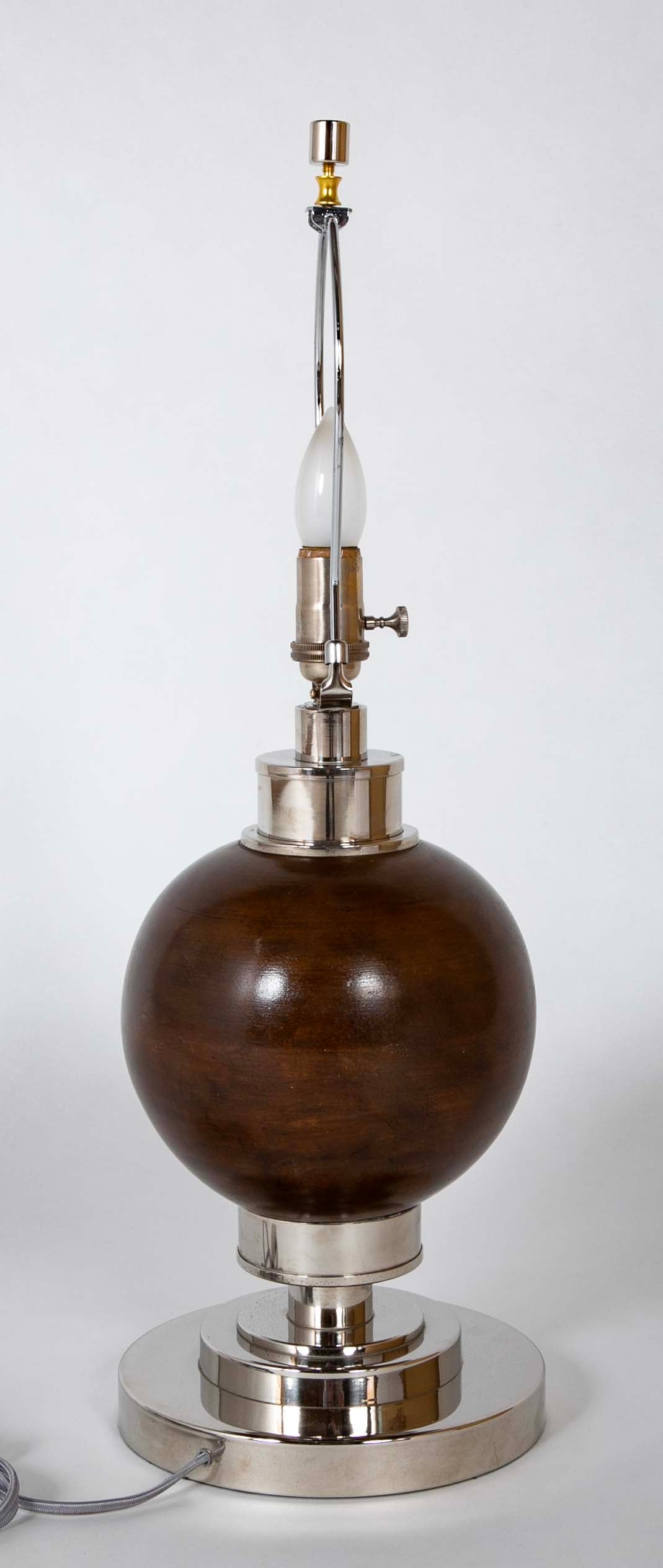 A French Turned Wood Sphere on Metal Base as a Lamp