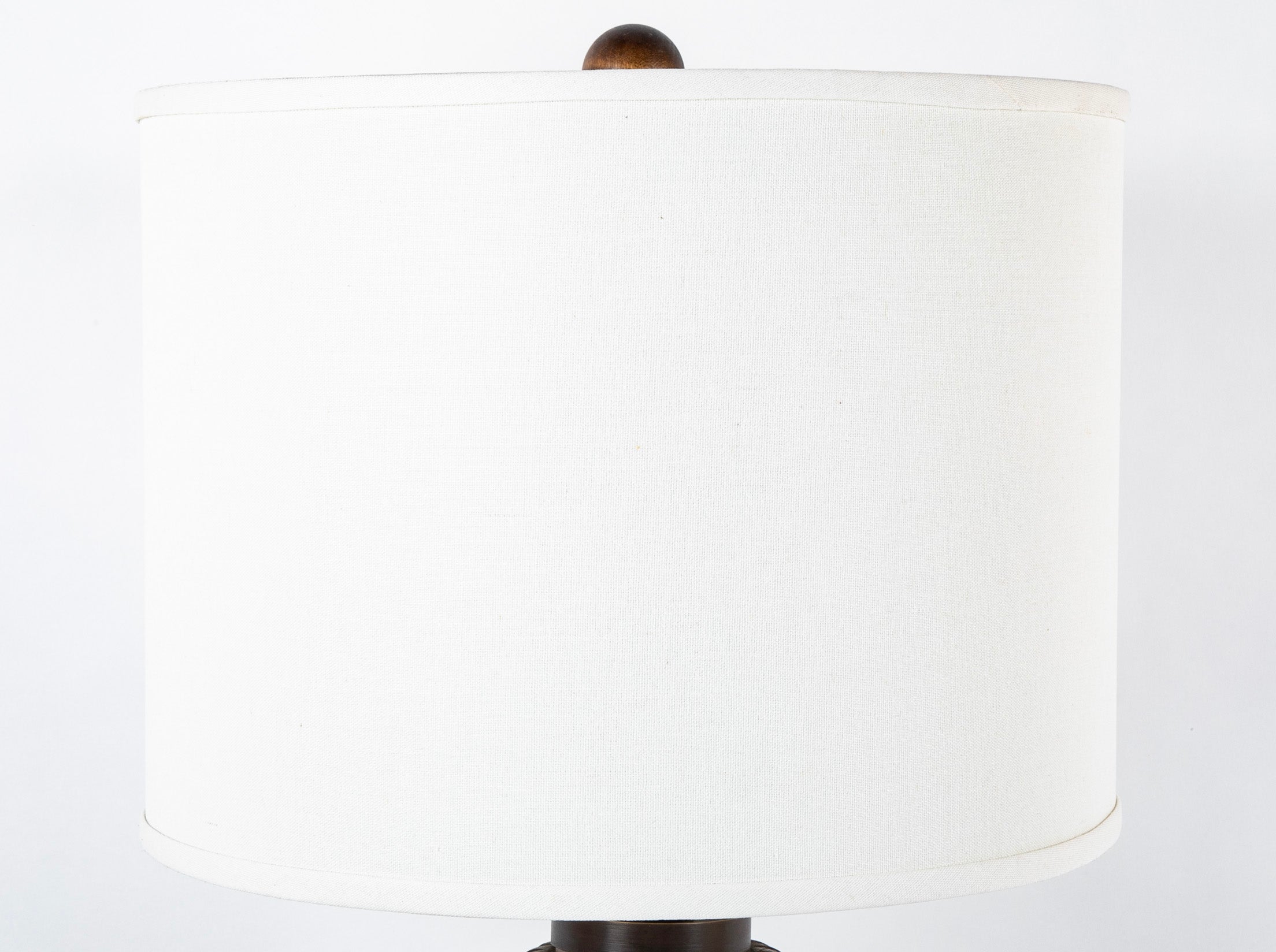 An Elongated Melon Shaped Wooden Lamp