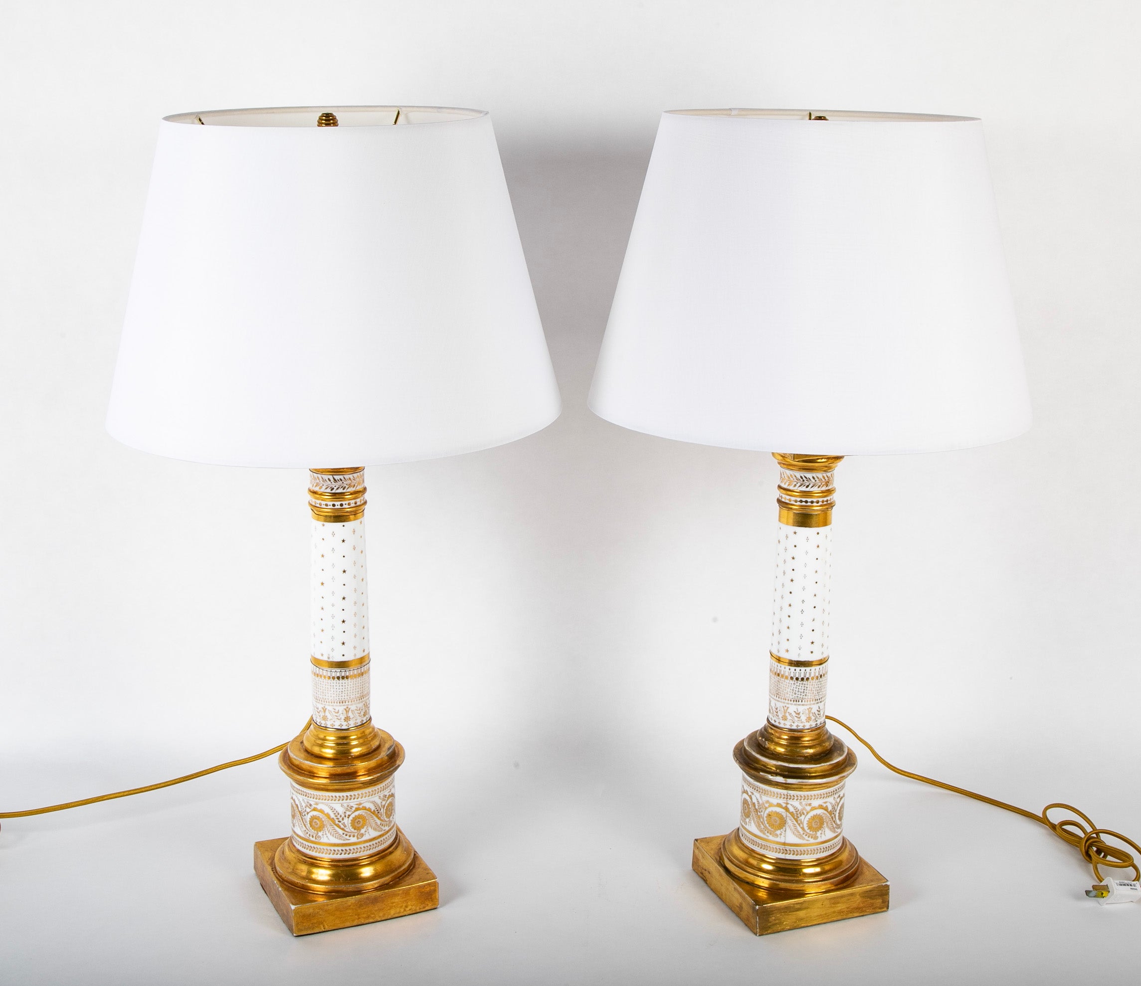 Pair of French Gilt on White Paris Porcelain Columnar Lamps
