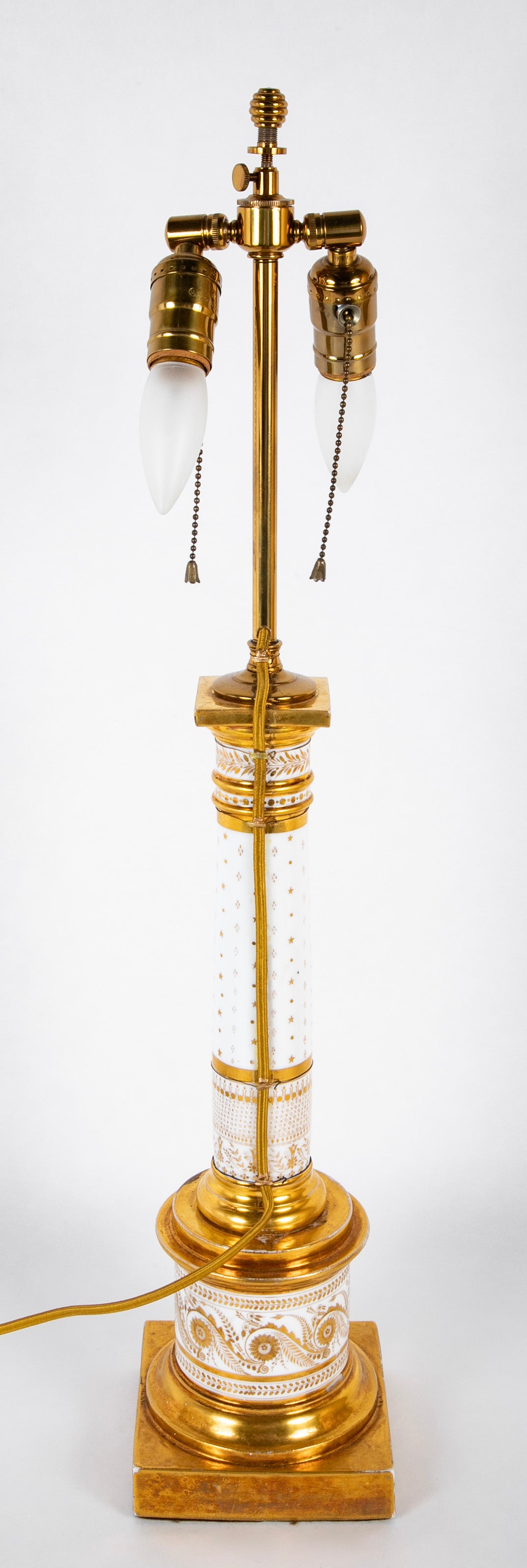 Pair of French Gilt on White Paris Porcelain Columnar Lamps
