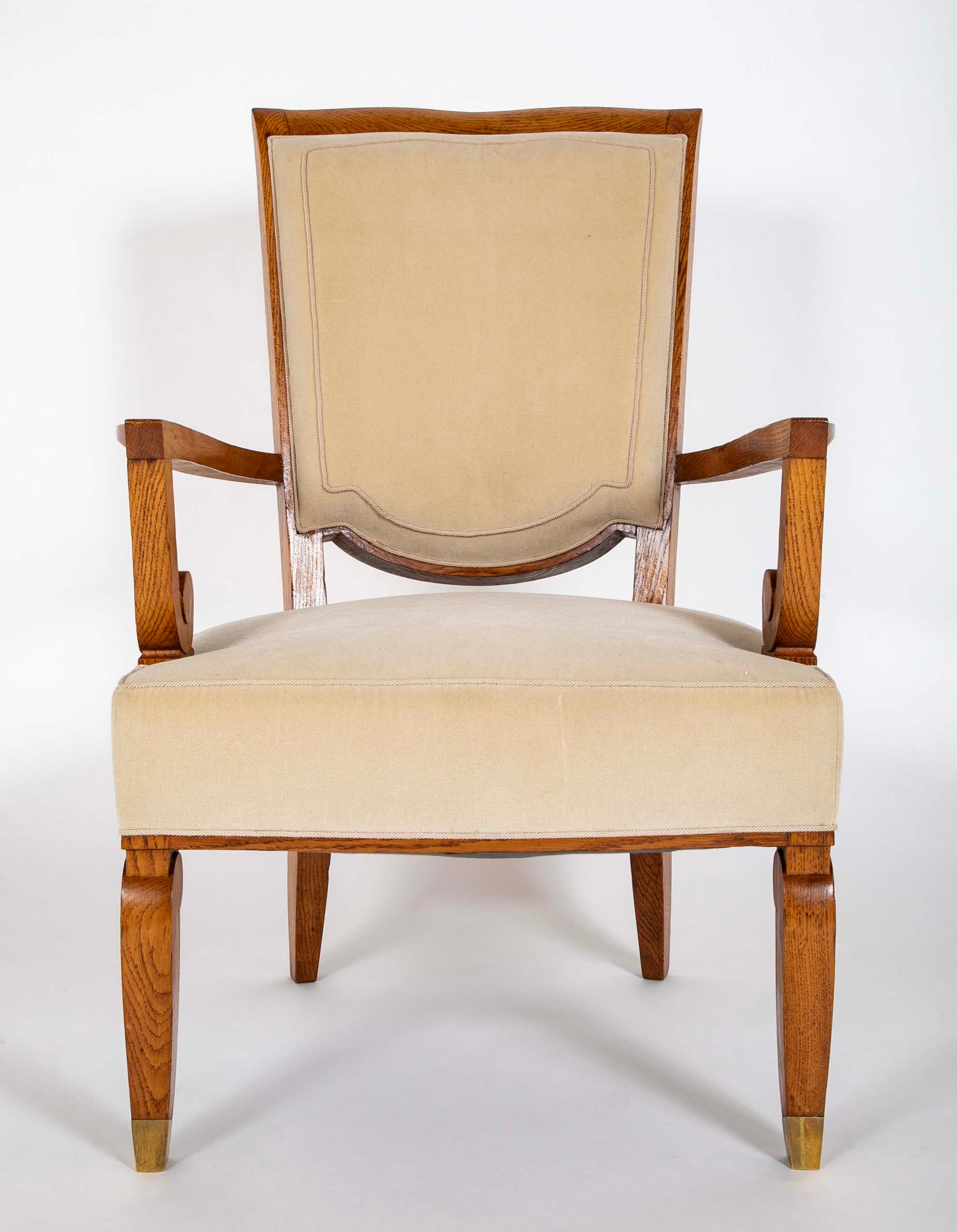 Pair of Jules Leleu Waxed Oak Armchairs