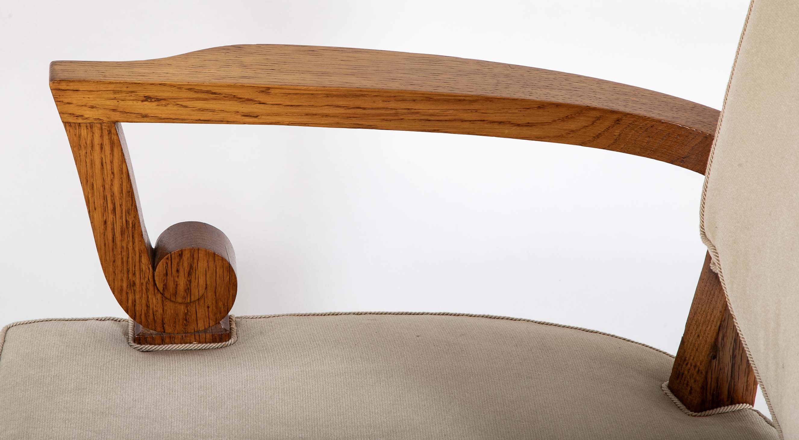 Pair of Jules Leleu Waxed Oak Armchairs