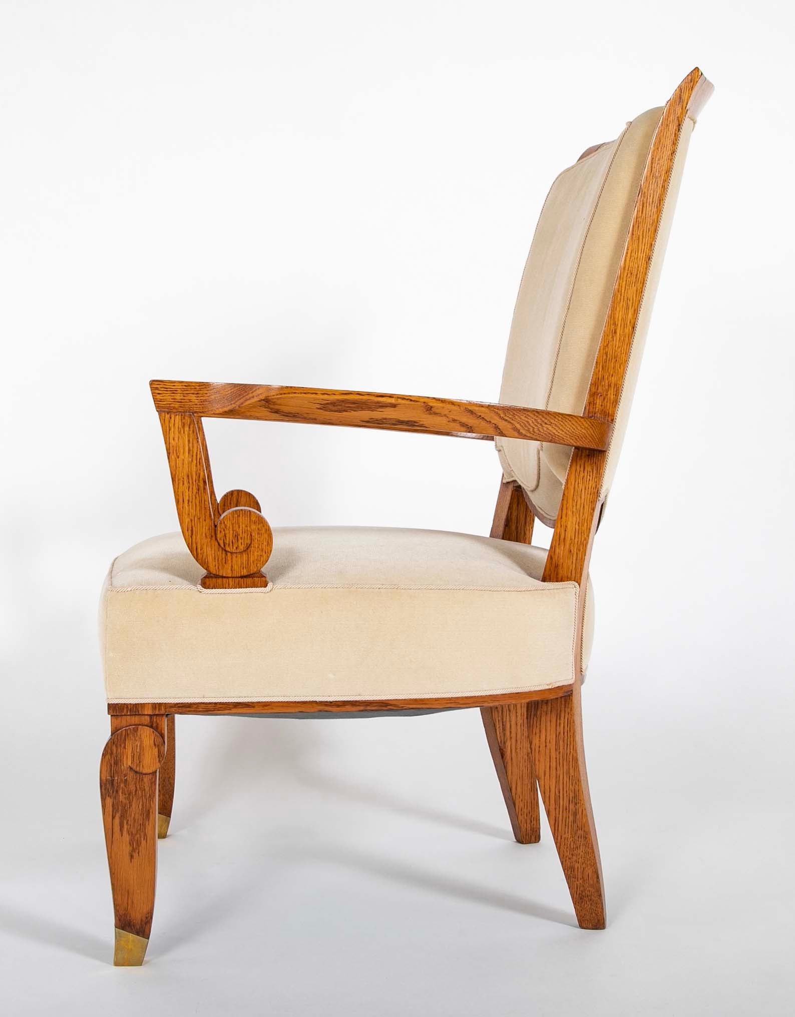 Pair of Jules Leleu Waxed Oak Armchairs
