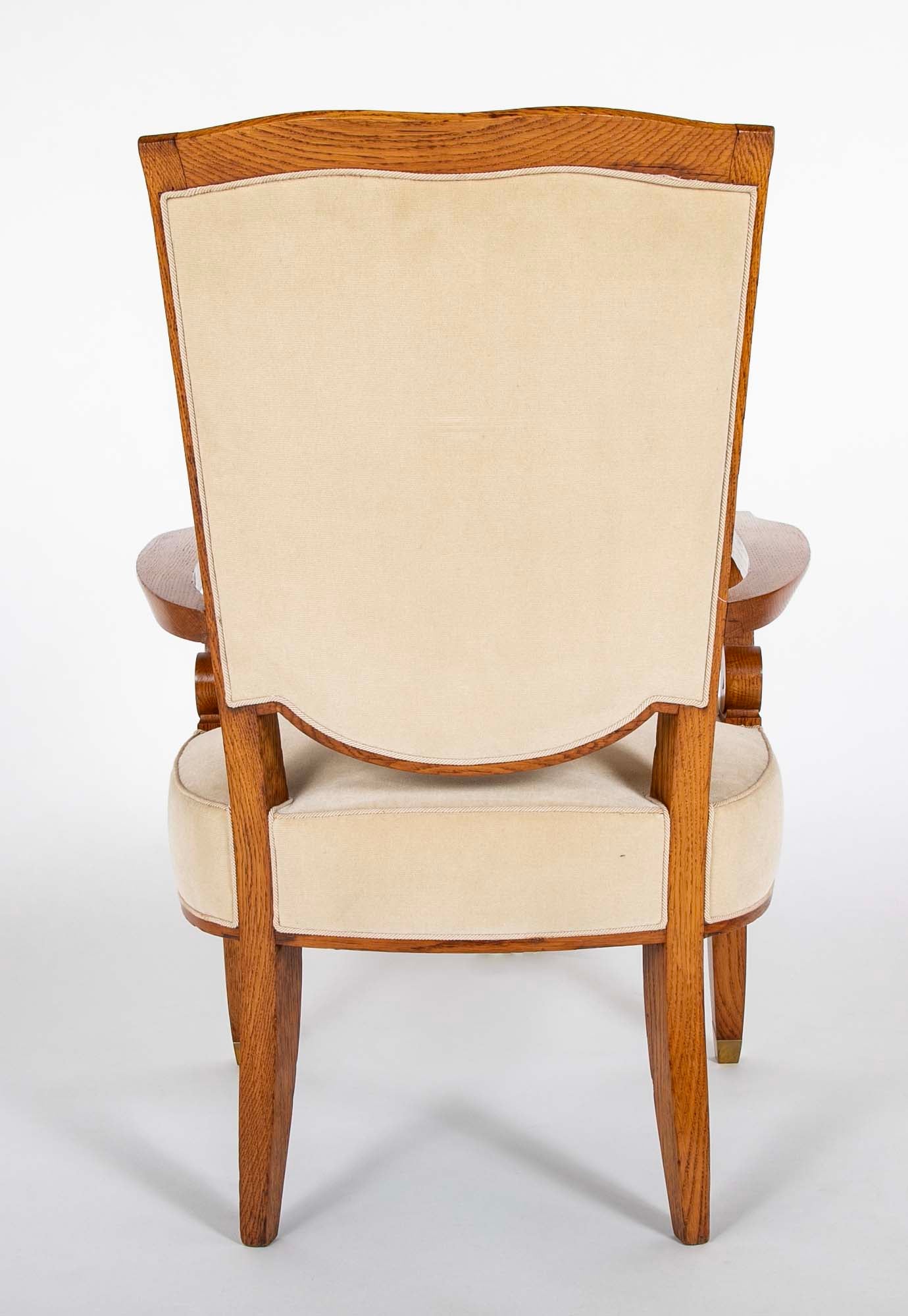 Pair of Jules Leleu Waxed Oak Armchairs
