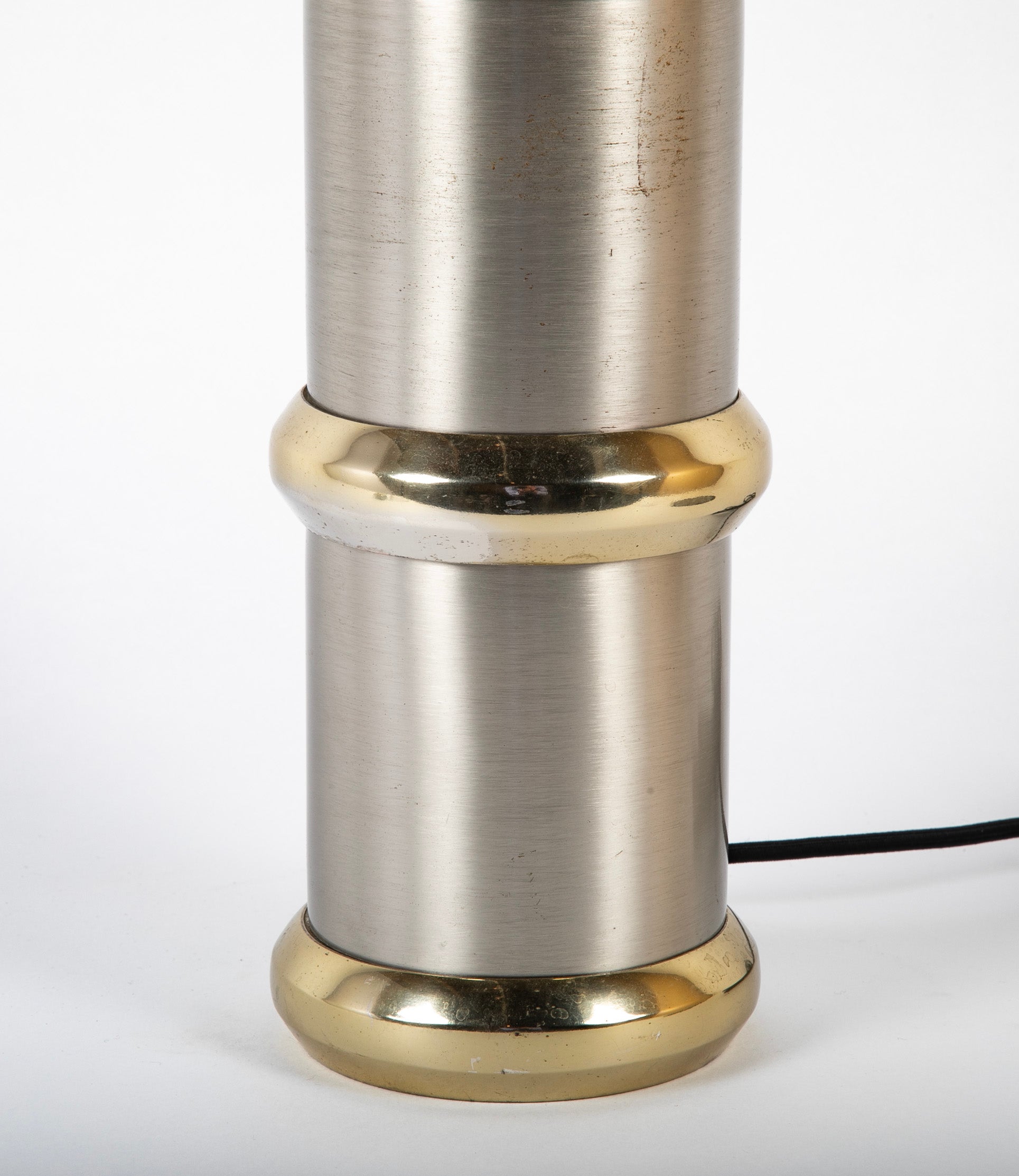 A Mid-Century Steel and Brass Lamp by Maison Charles