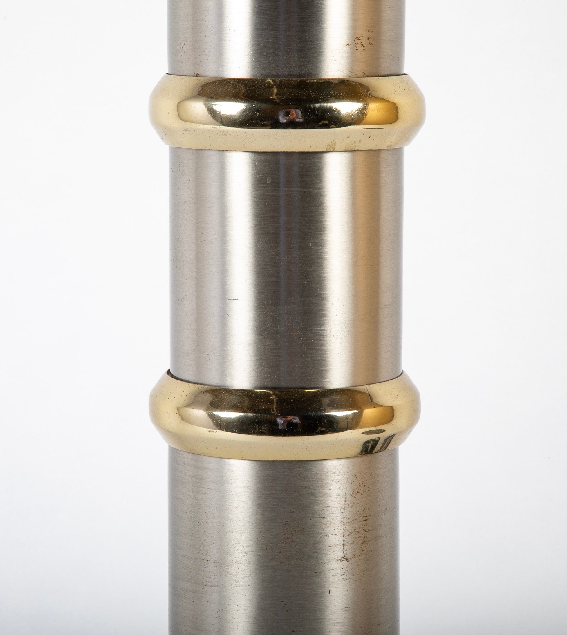 A Mid-Century Steel and Brass Lamp by Maison Charles