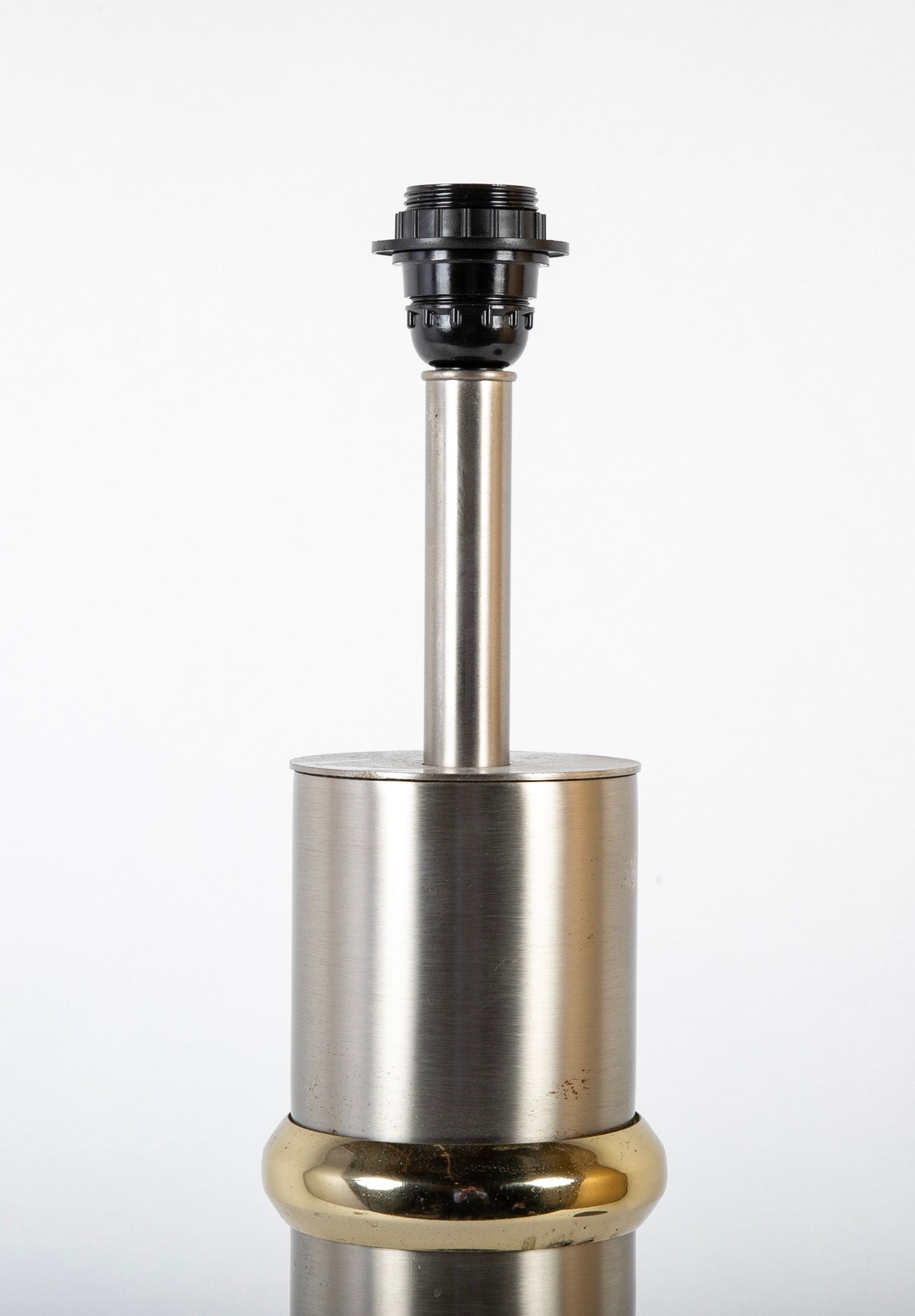 A Mid-Century Steel and Brass Lamp by Maison Charles