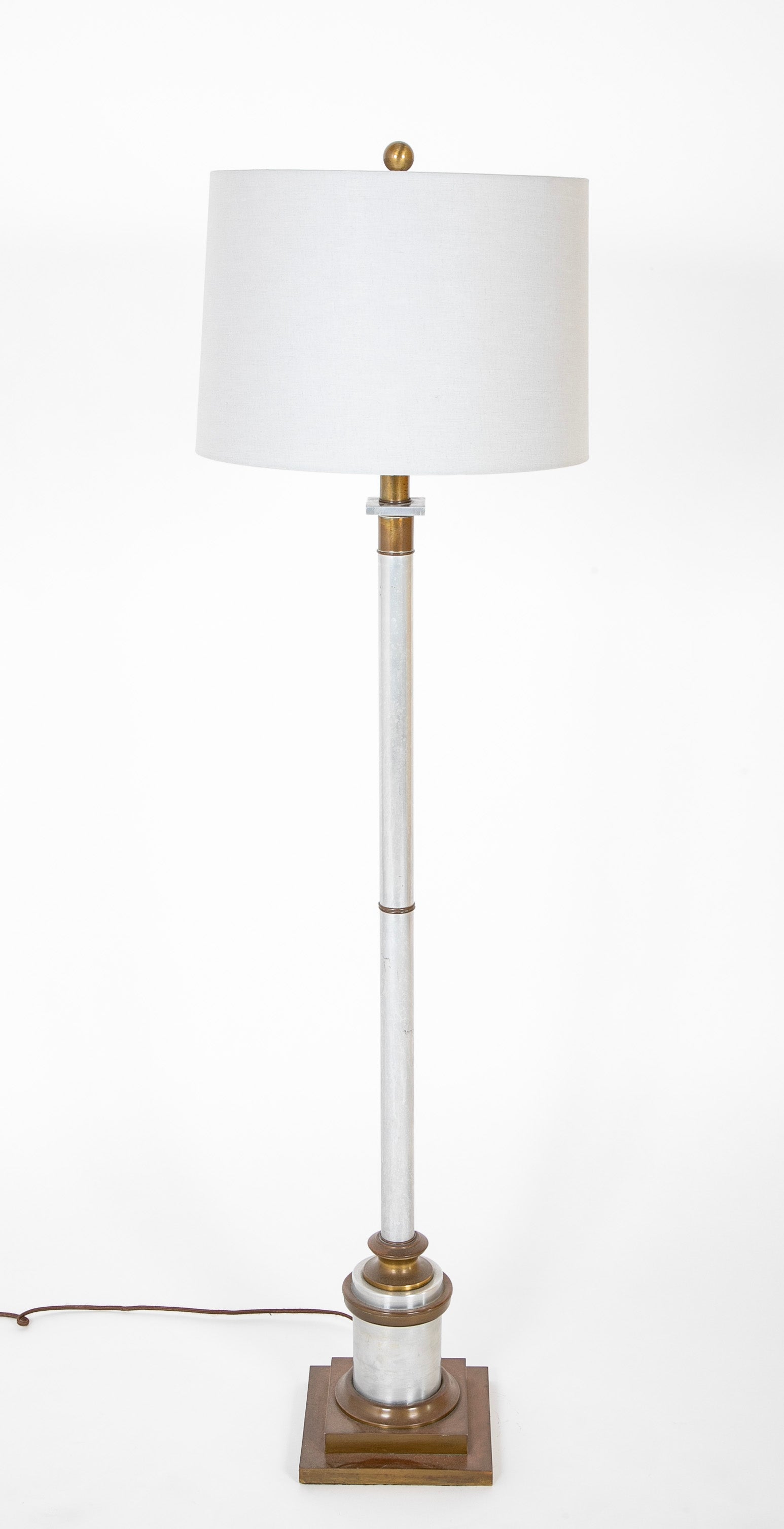 A Mid-Century Brass & Polished Metal Floor Lamp