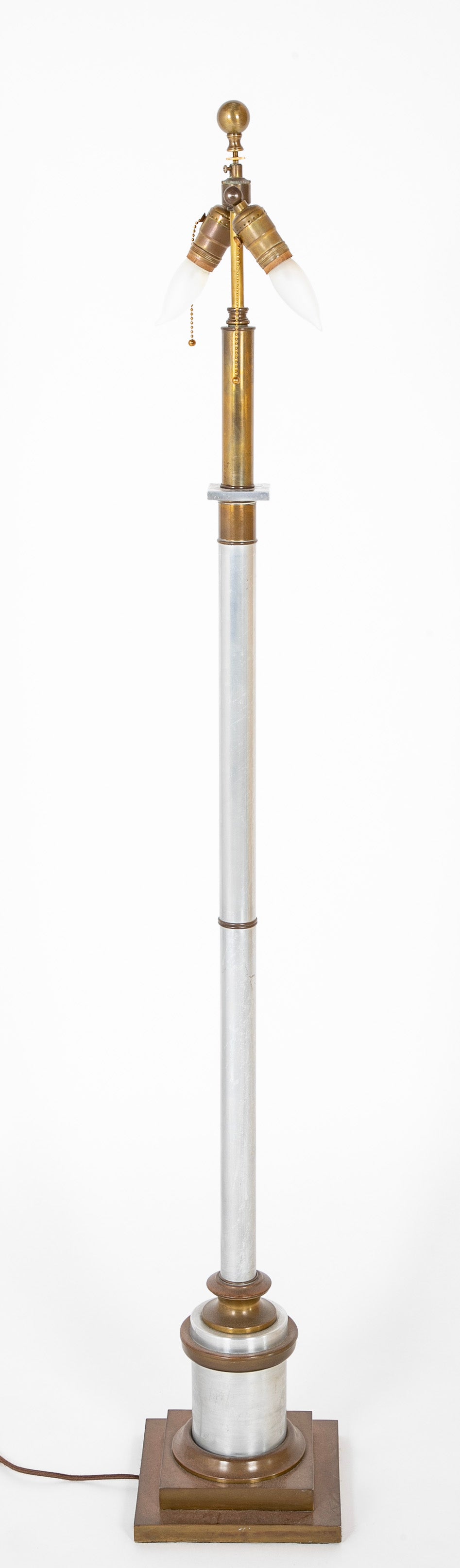 A Mid-Century Brass & Polished Metal Floor Lamp