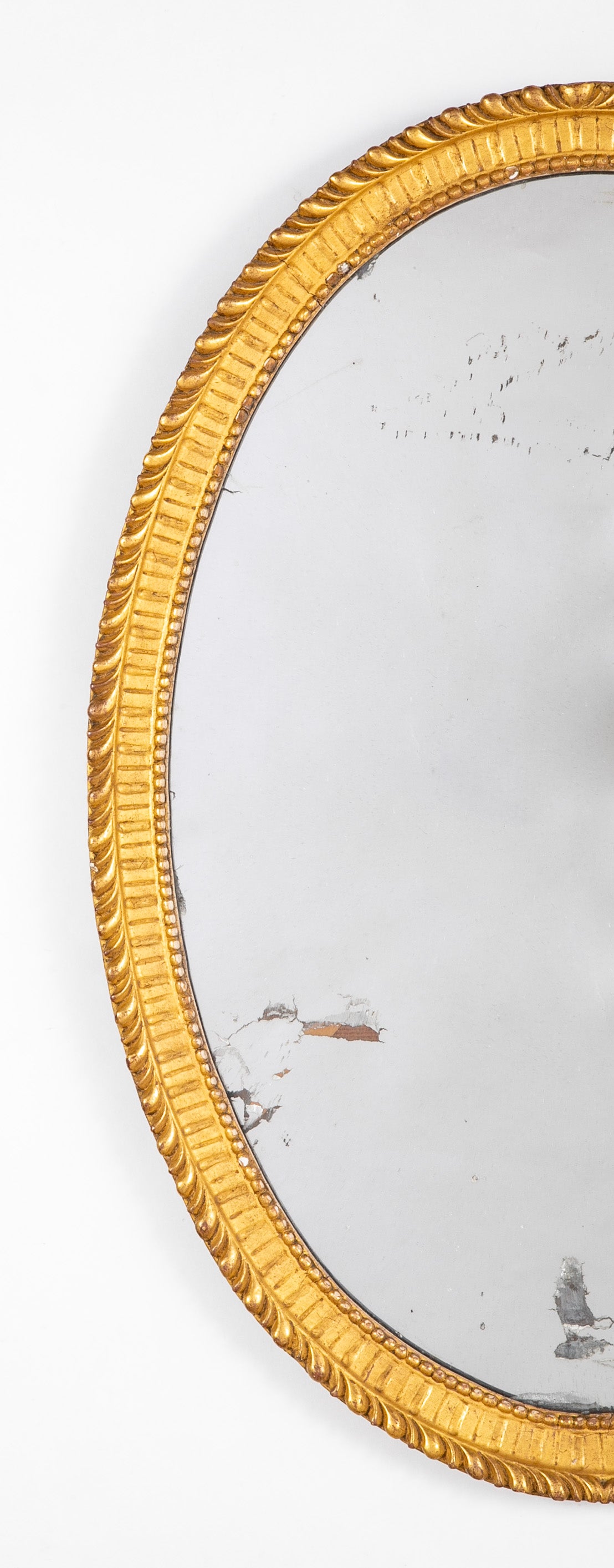 Oval French Mirror with Carved Gilt Wood Frame