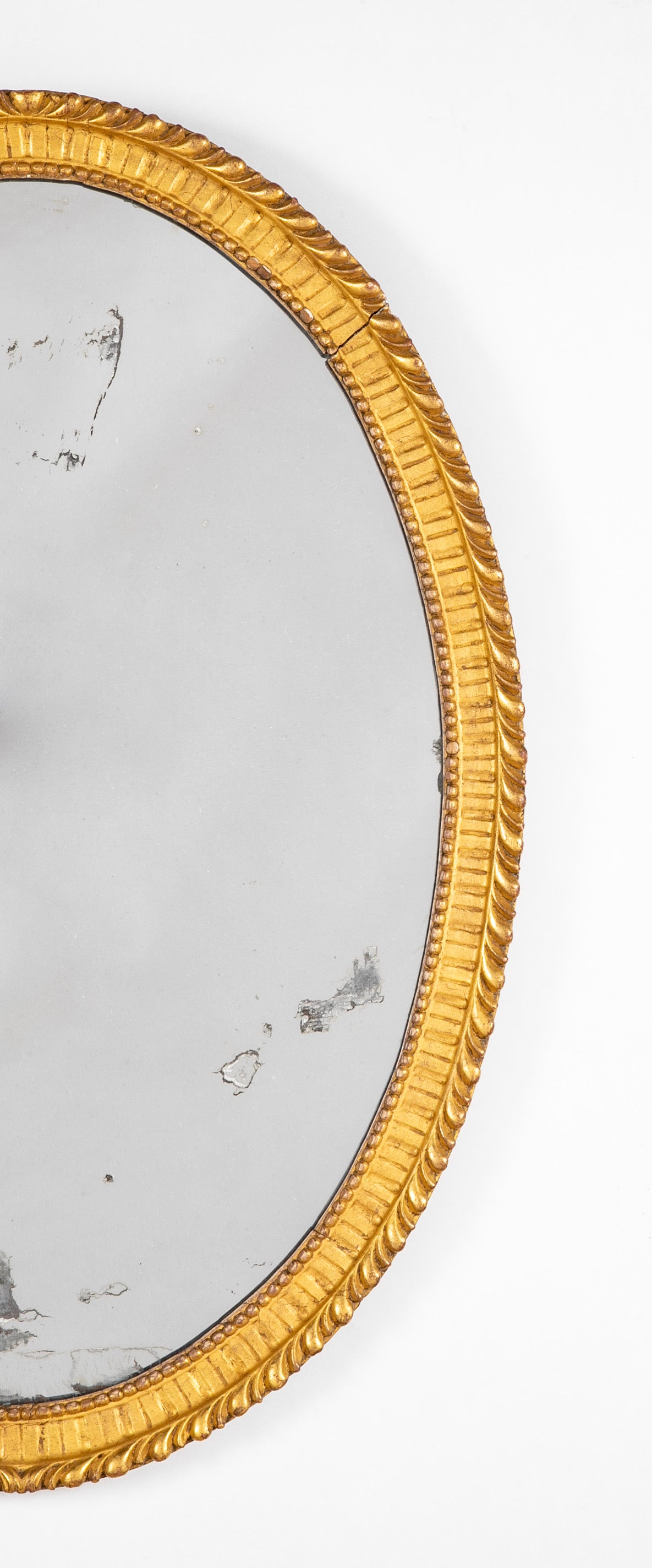 Oval French Mirror with Carved Gilt Wood Frame