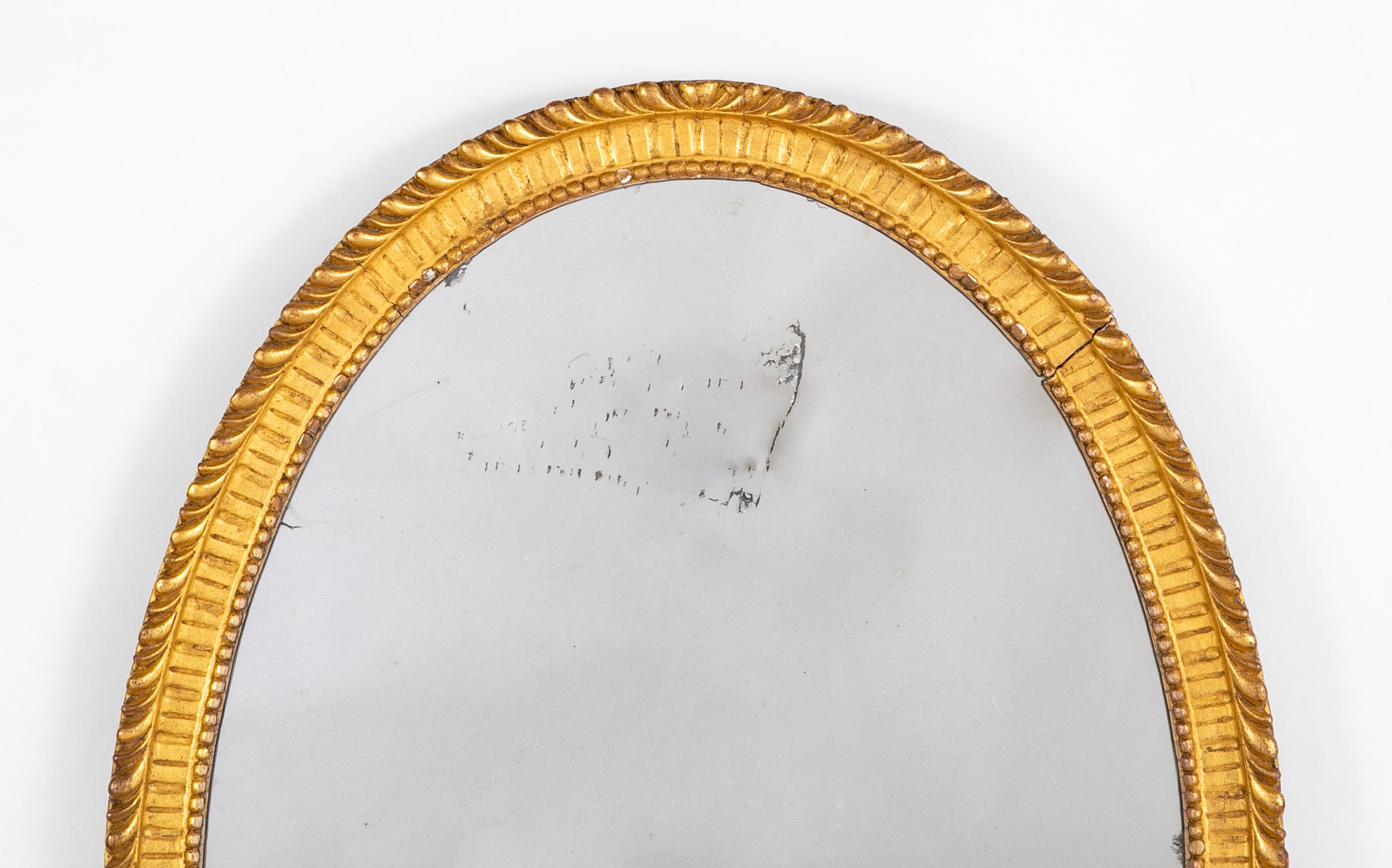 Oval French Mirror with Carved Gilt Wood Frame