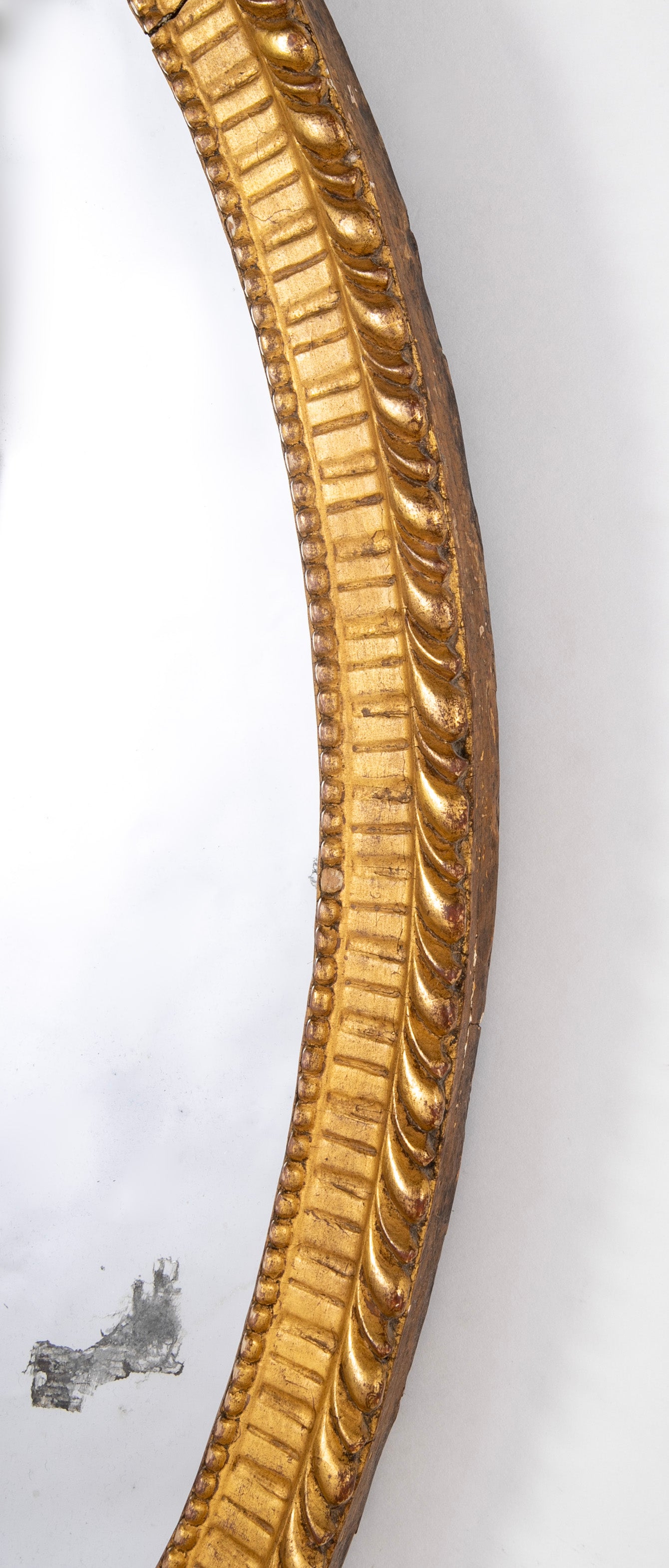 Oval French Mirror with Carved Gilt Wood Frame