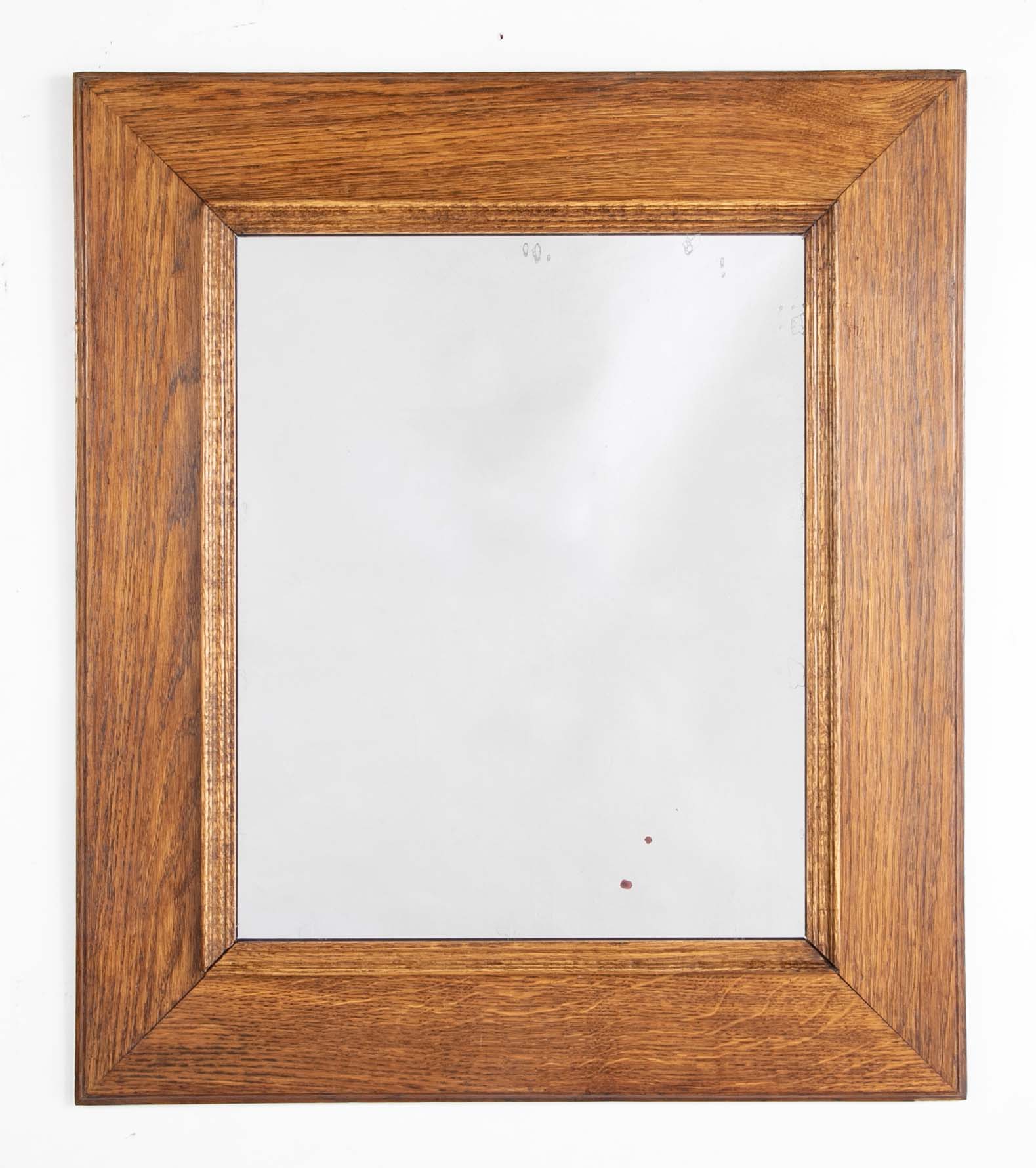 Early 20th Century French Natural Form Molded Oak Framed Mirror