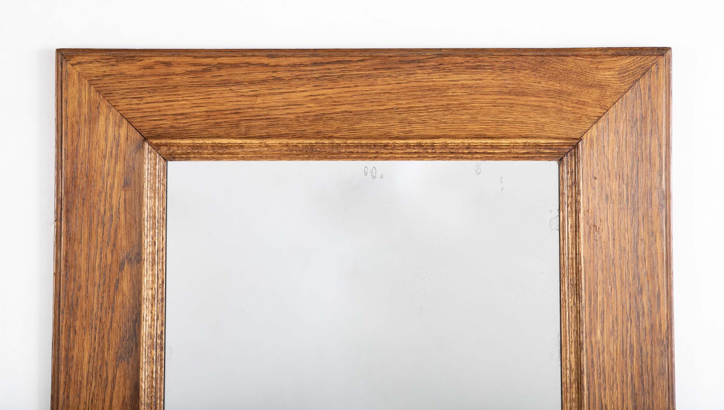 Early 20th Century French Natural Form Molded Oak Framed Mirror