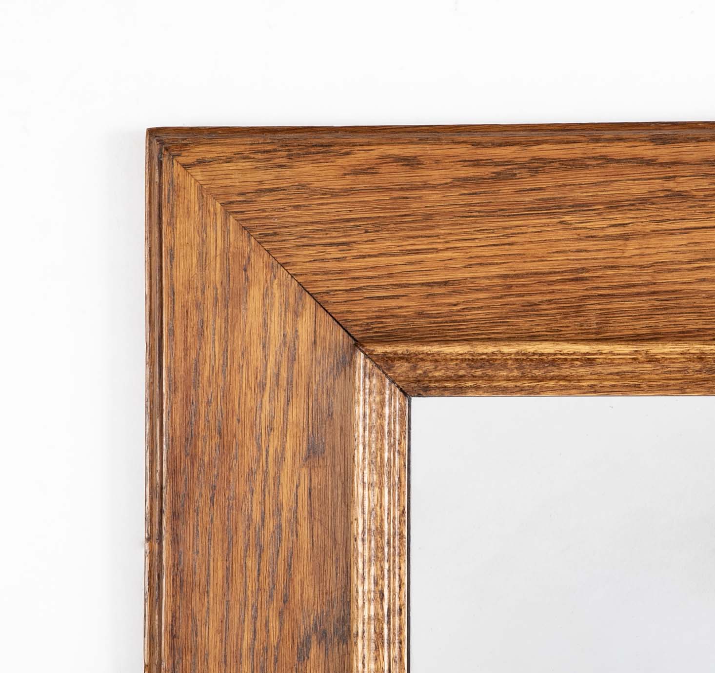 Early 20th Century French Natural Form Molded Oak Framed Mirror