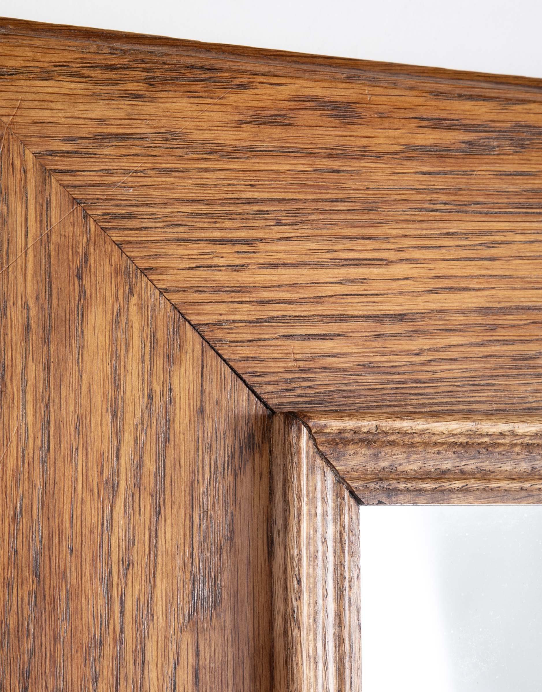 Early 20th Century French Natural Form Molded Oak Framed Mirror