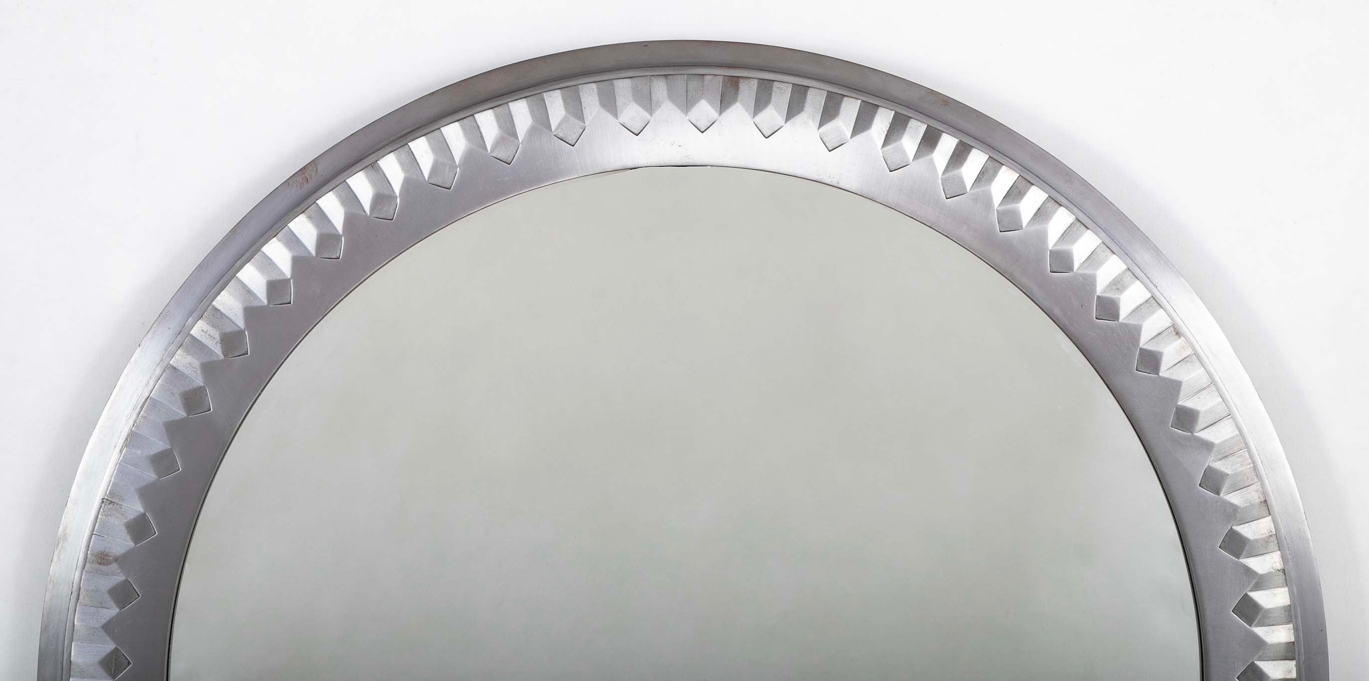 A Polished Steel Circular Mirror by Adalbert Szabo
