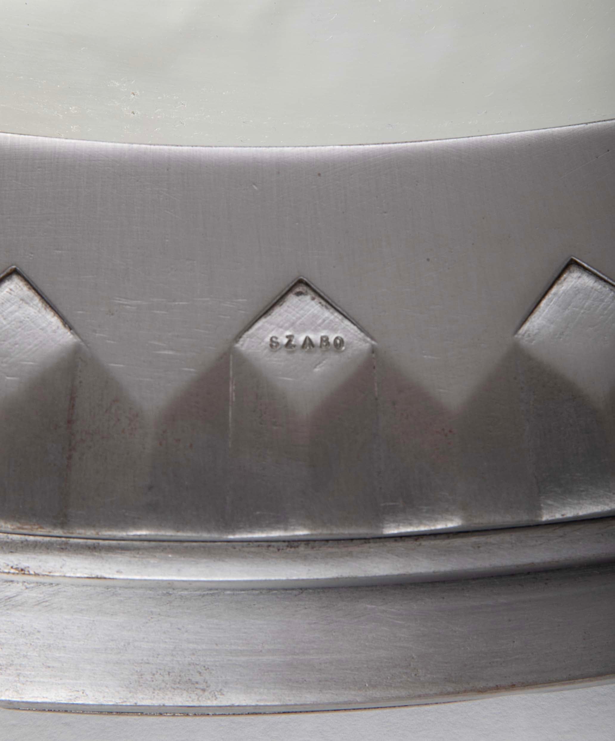 A Polished Steel Circular Mirror by Adalbert Szabo