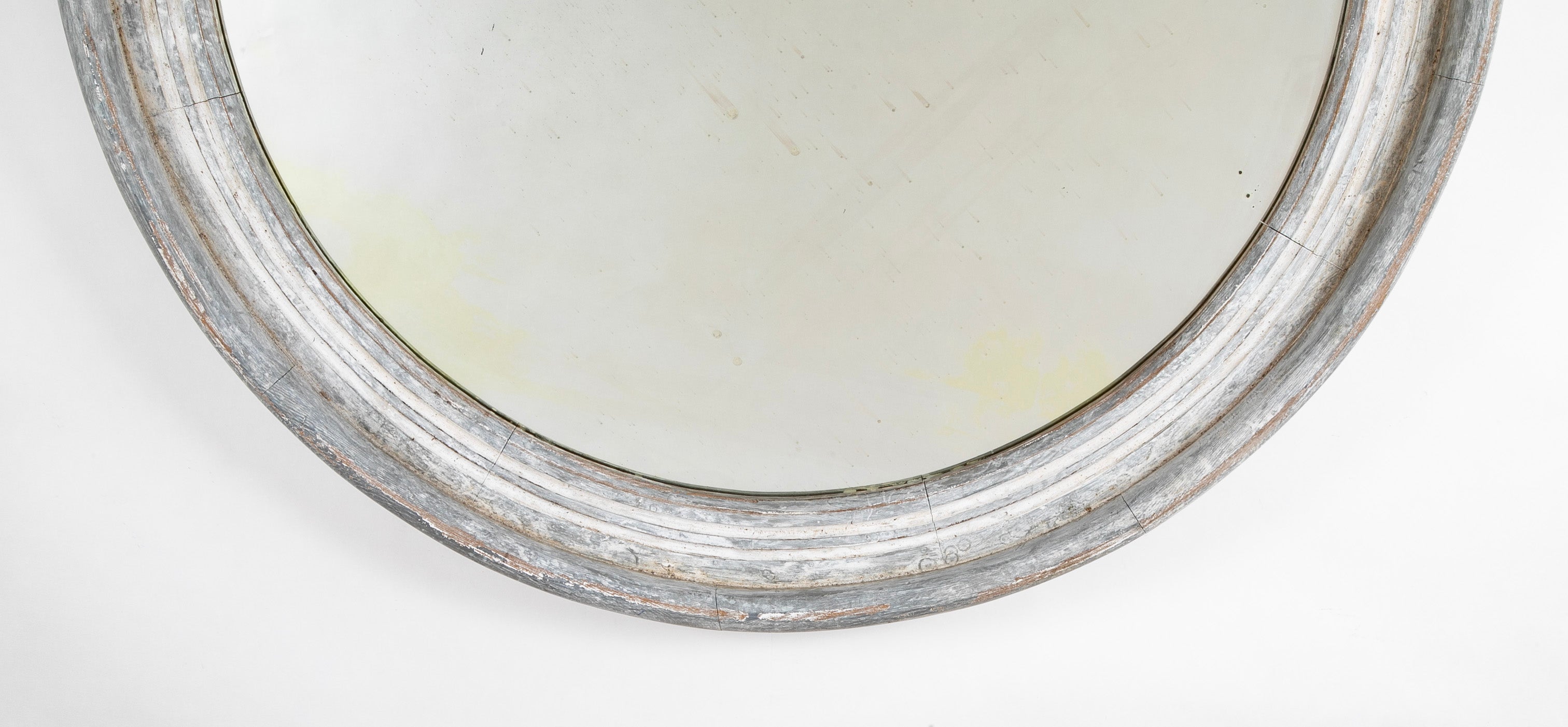 A Round Swedish Mirror with Whitewashed & Patinated Heavy Wood Frame