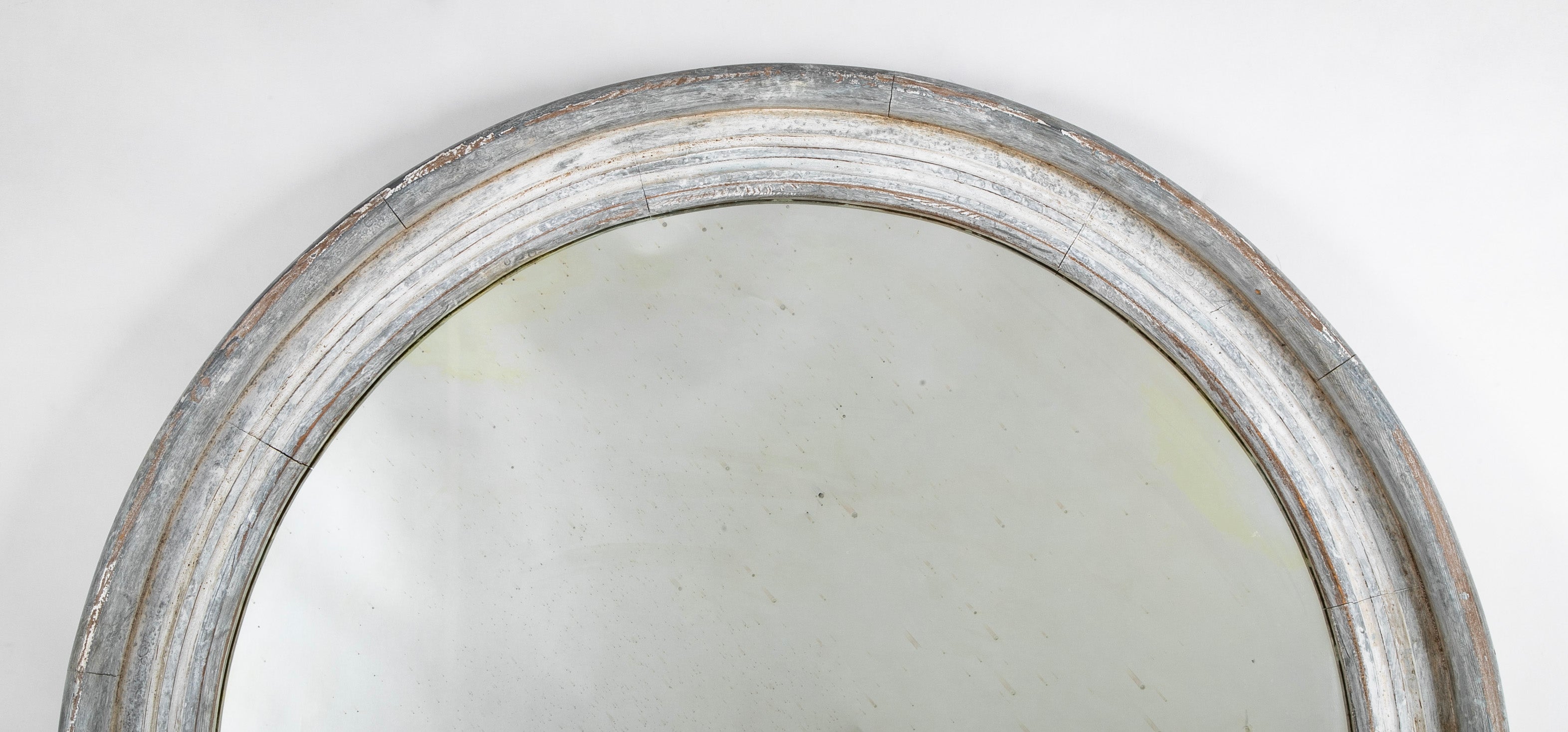 A Round Swedish Mirror with Whitewashed & Patinated Heavy Wood Frame