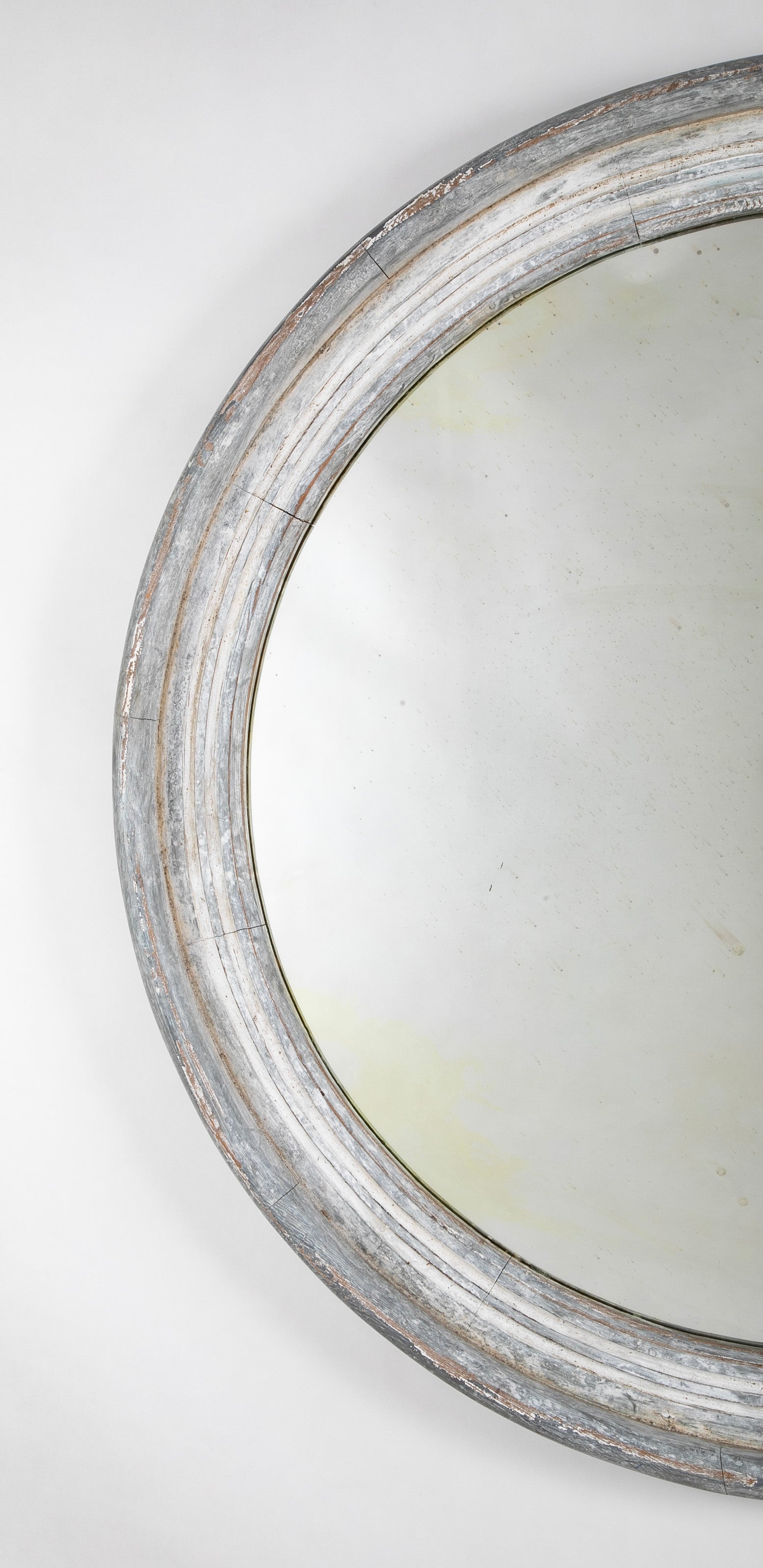 A Round Swedish Mirror with Whitewashed & Patinated Heavy Wood Frame