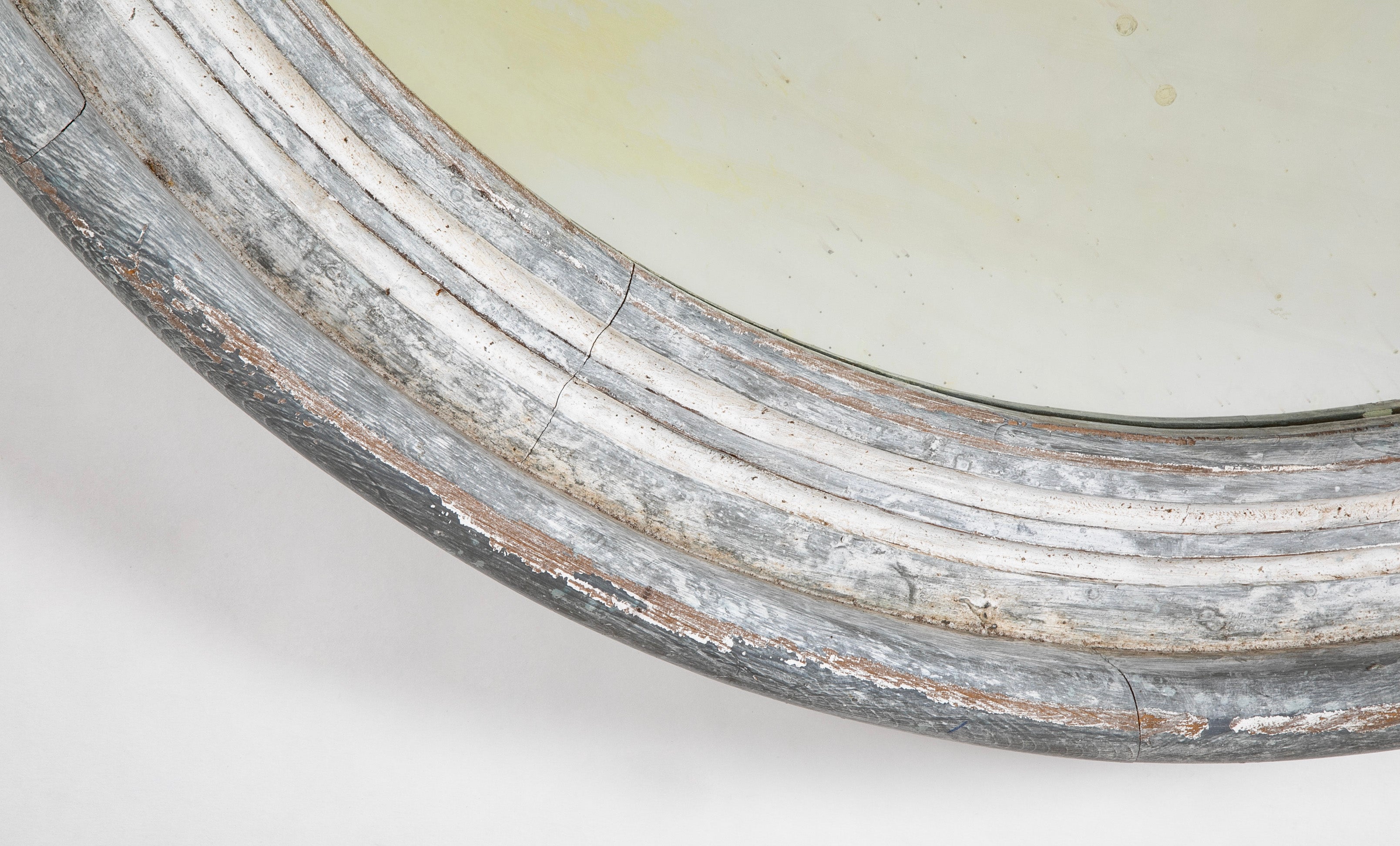 A Round Swedish Mirror with Whitewashed & Patinated Heavy Wood Frame