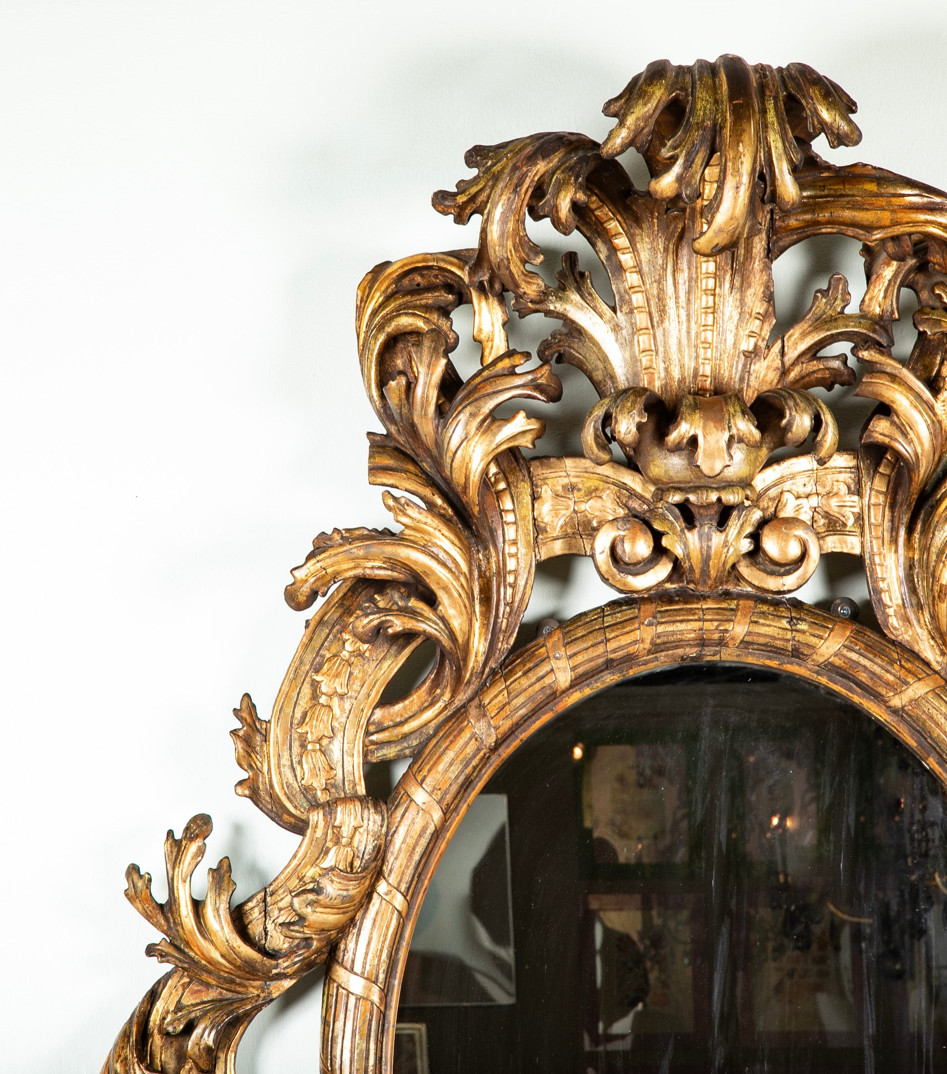 Large Oval Italian Mirror with Baroque Carved Giltwood Frame