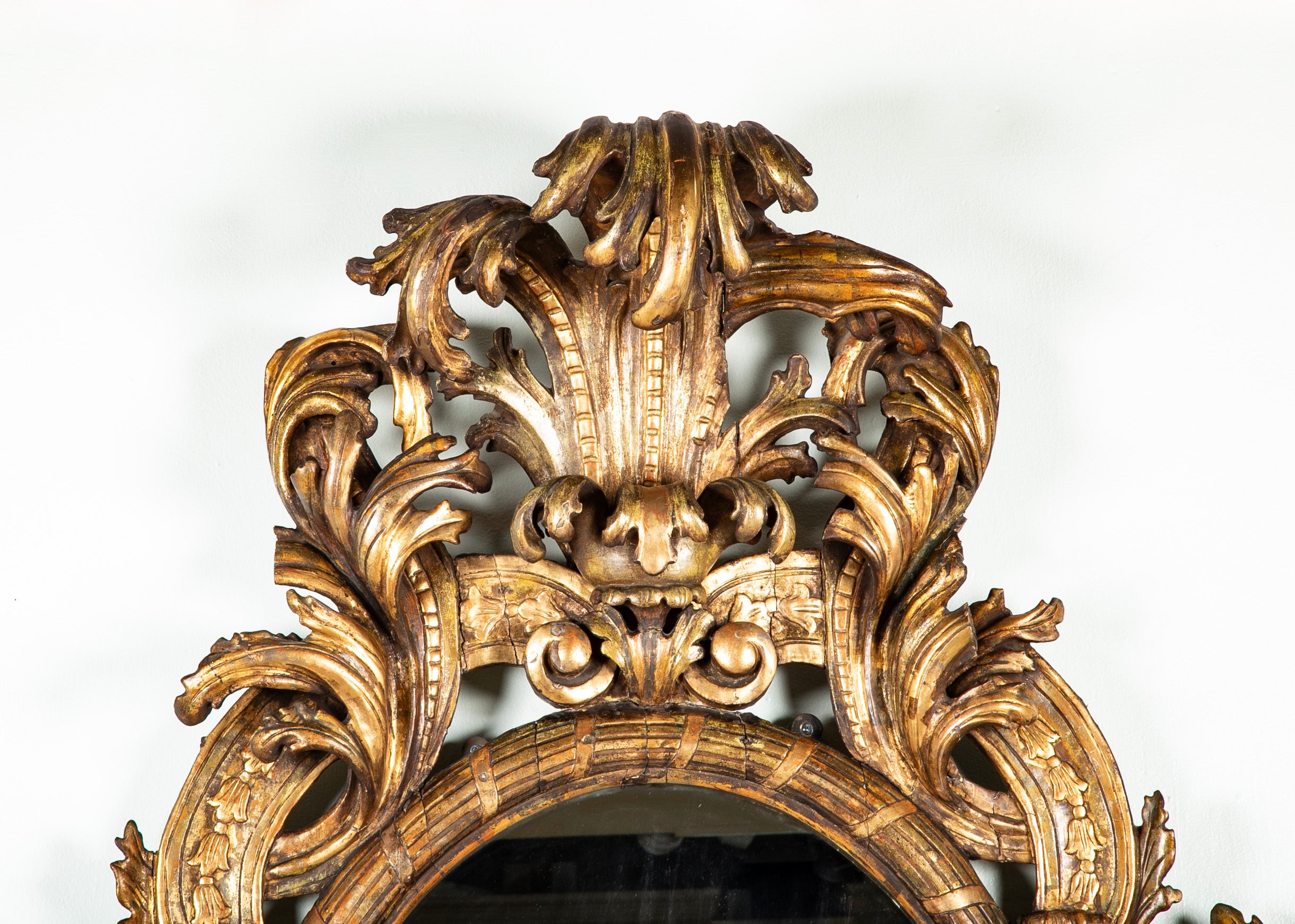 Large Oval Italian Mirror with Baroque Carved Giltwood Frame