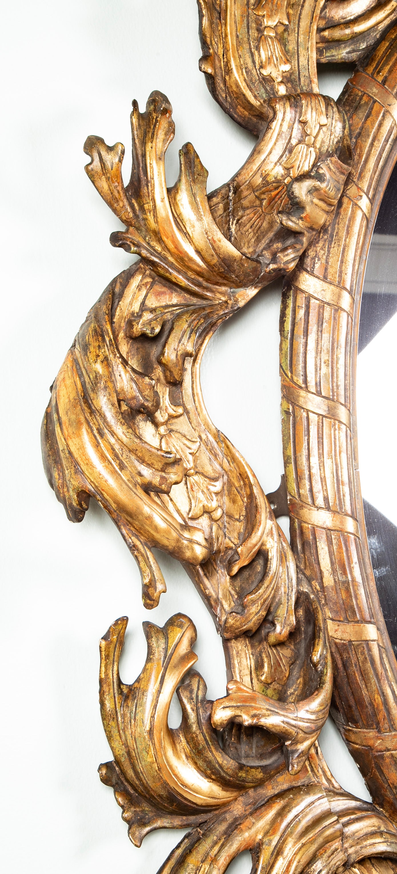 Large Oval Italian Mirror with Baroque Carved Giltwood Frame