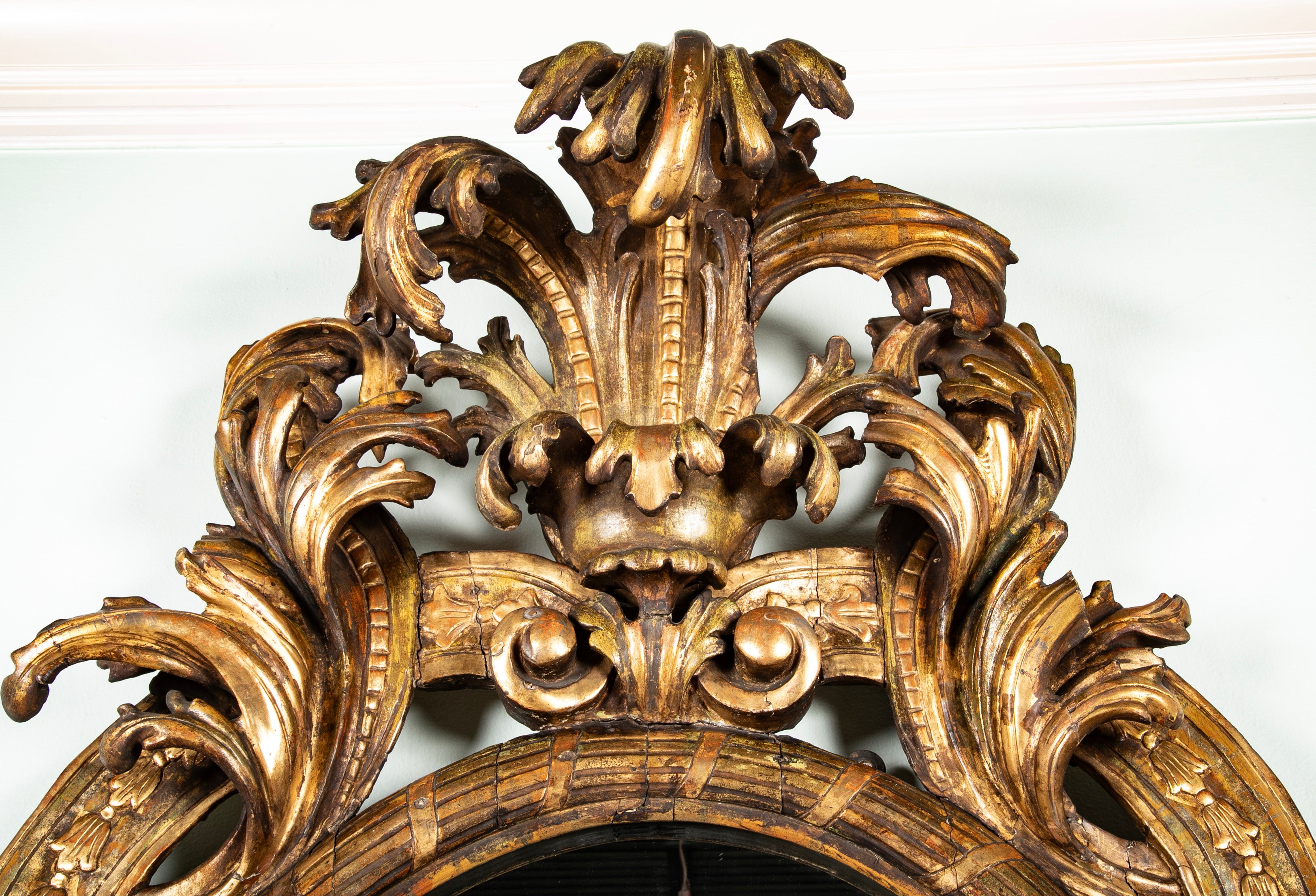 Large Oval Italian Mirror with Baroque Carved Giltwood Frame